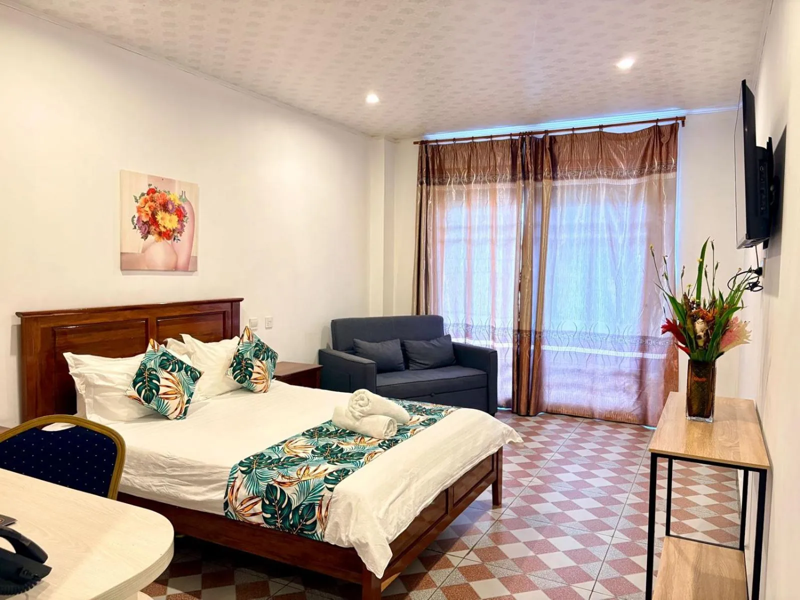 Photo of the whole room, Bed in Crown Royale Hotel & Lounge