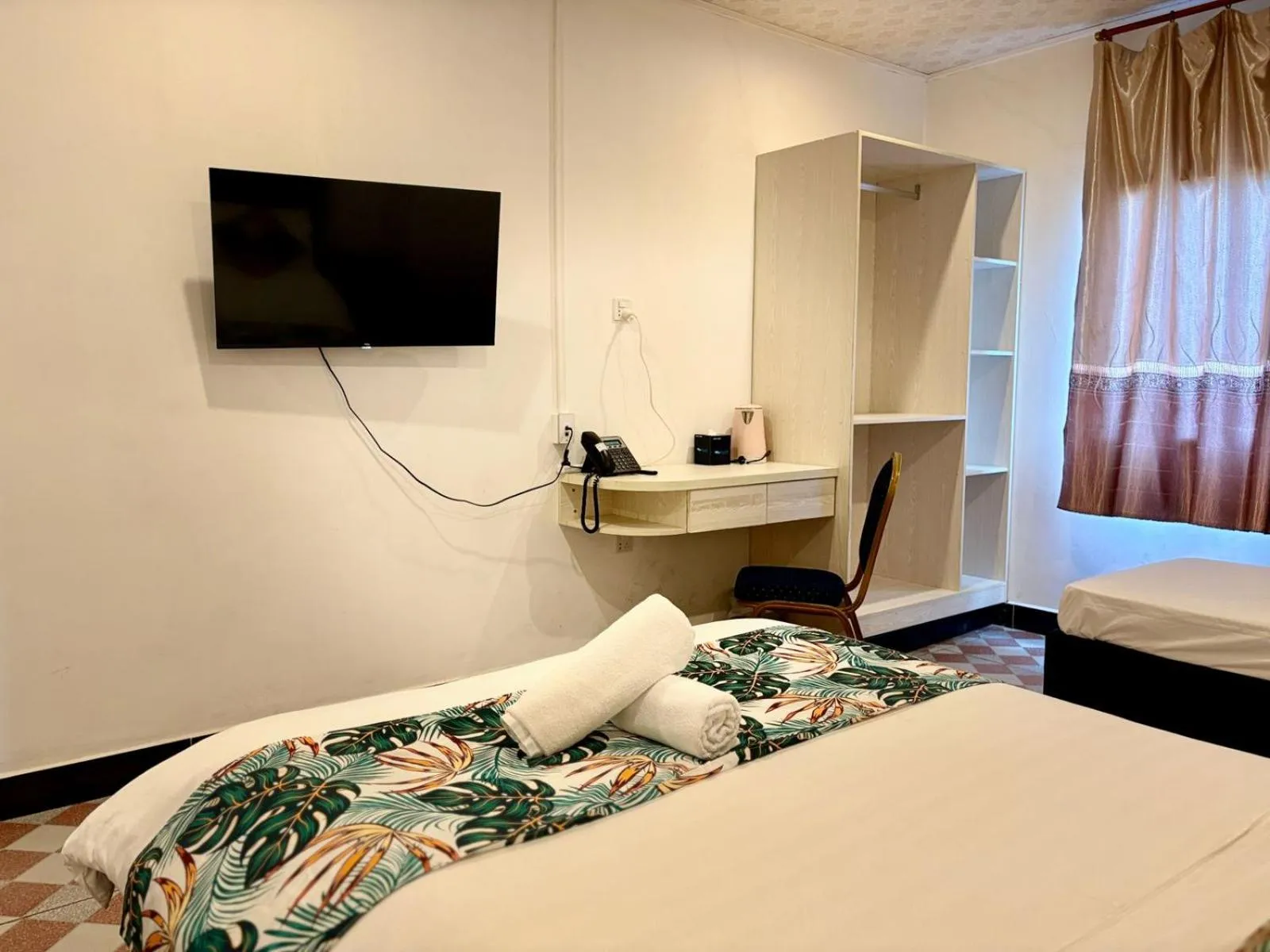 Bed in Crown Royale Hotel & Lounge