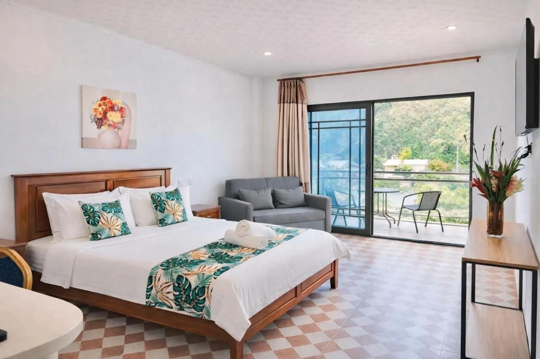 Bed in Crown Royale Hotel & Lounge