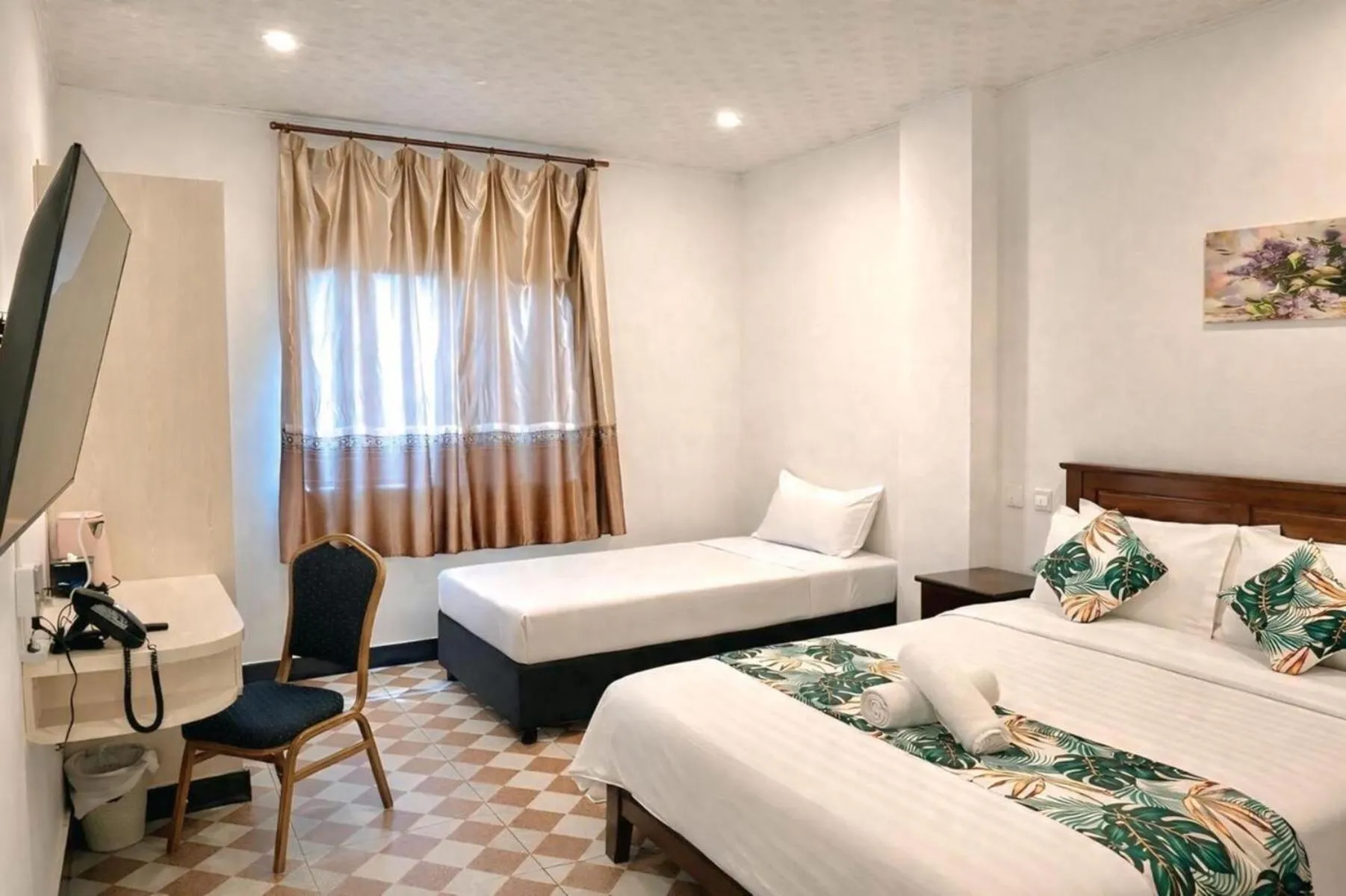 Bed in Crown Royale Hotel & Lounge