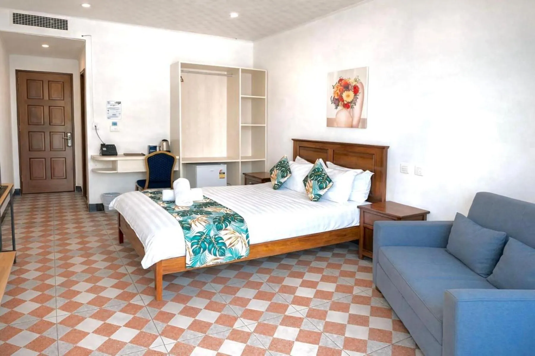 Bed in Crown Royale Hotel & Lounge