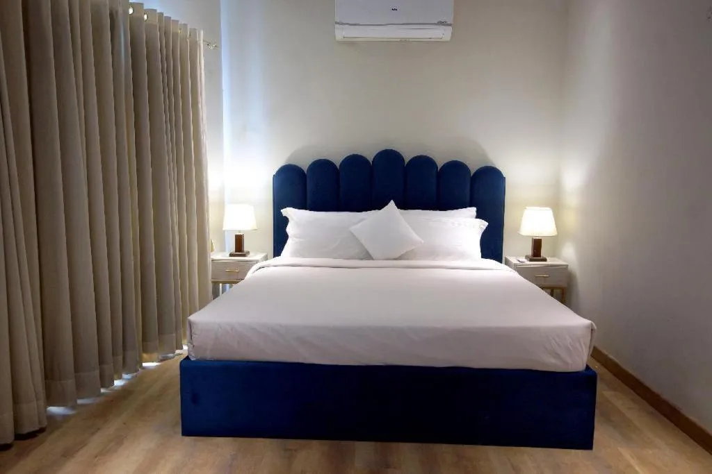 Bed in The Opus Luxury Residences