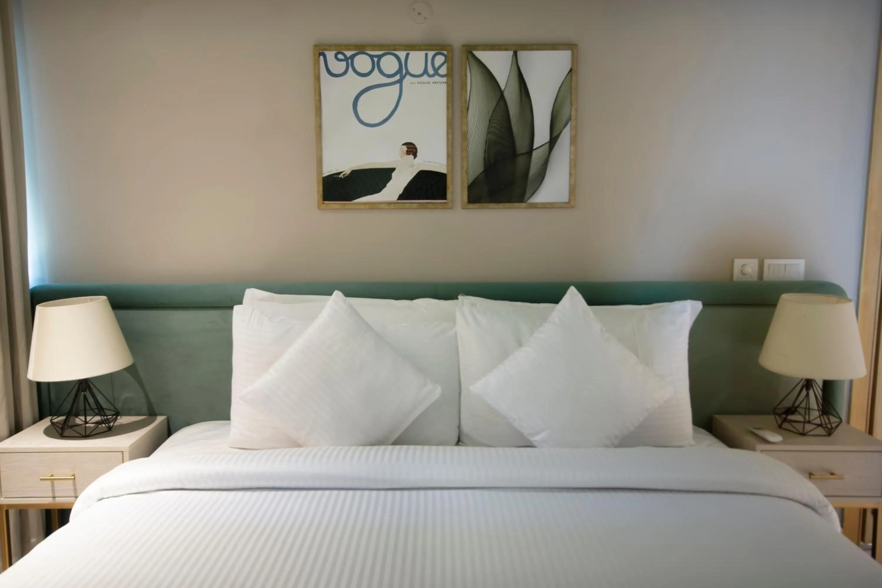 Bed in The Opus Luxury Residences