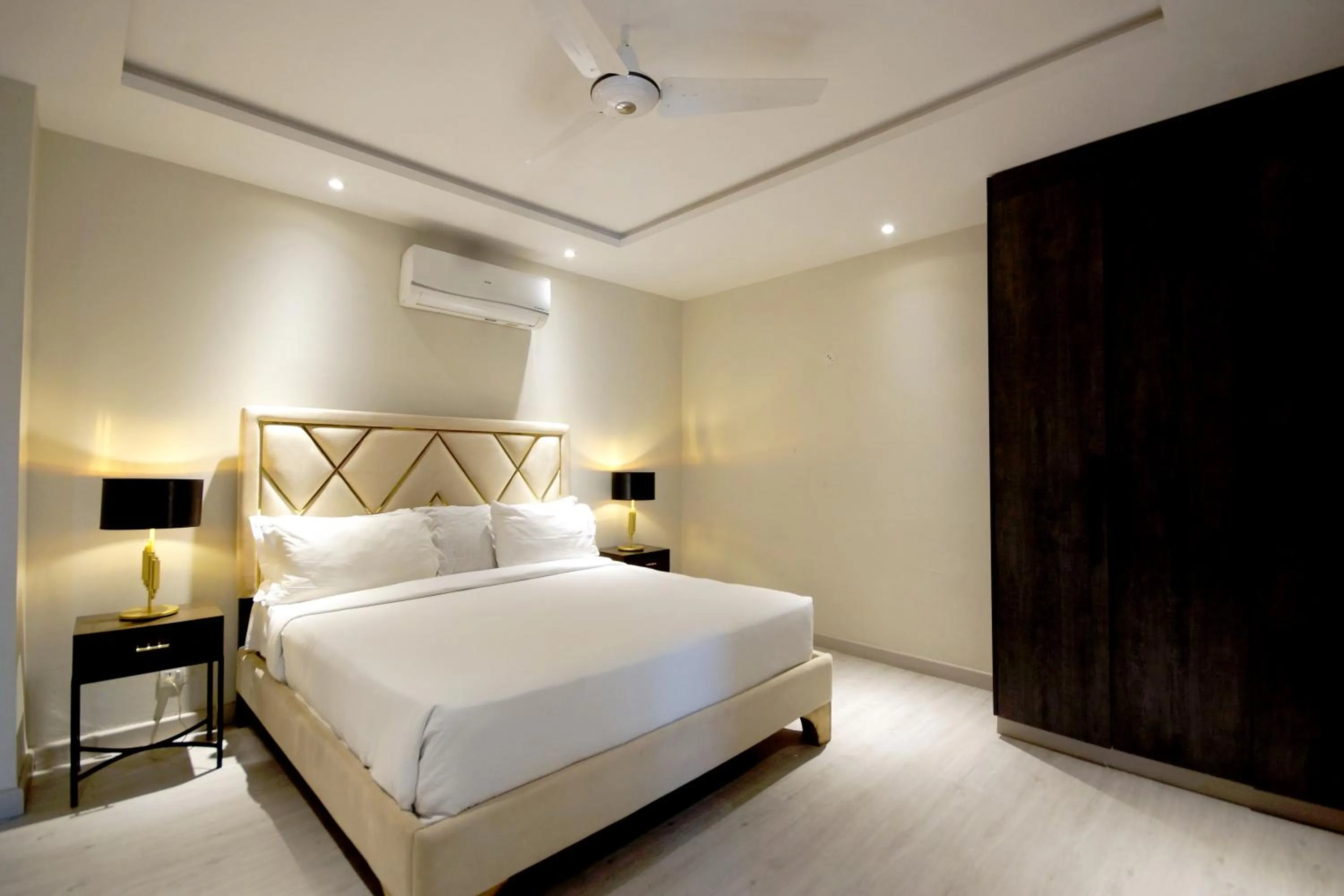 Bed in The Opus Luxury Residences