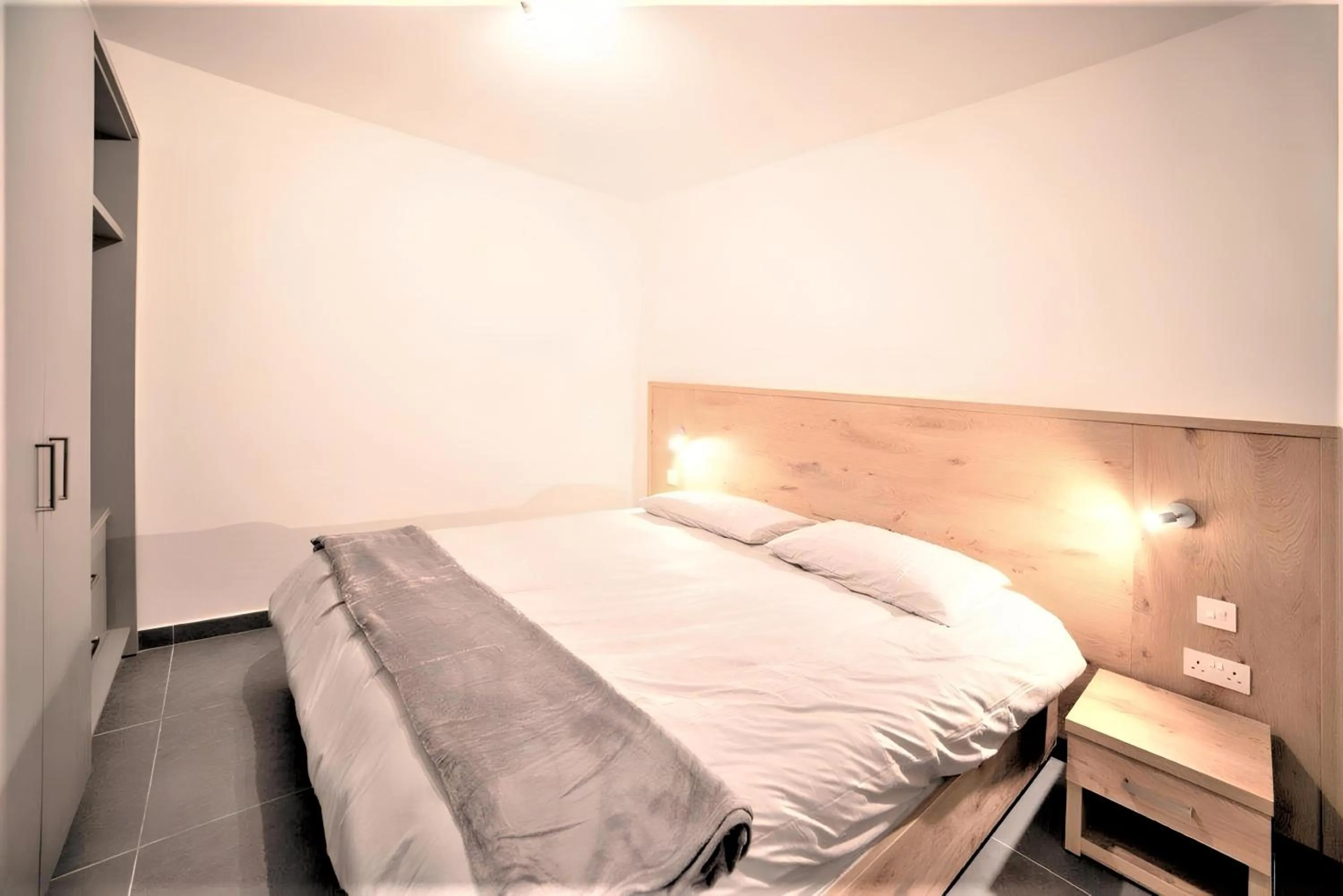 Bed in Elise Apartments