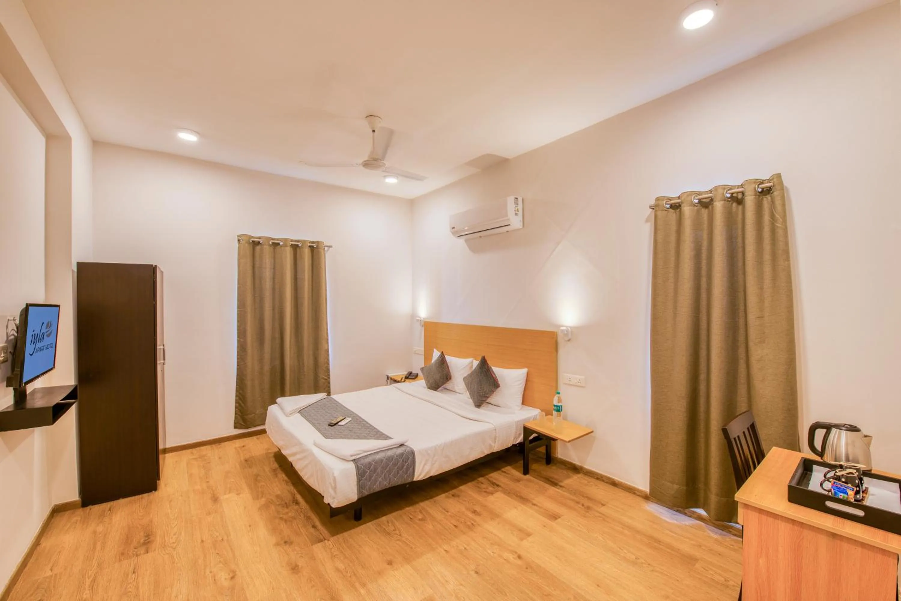 Bed in Iyla Apart Hotel