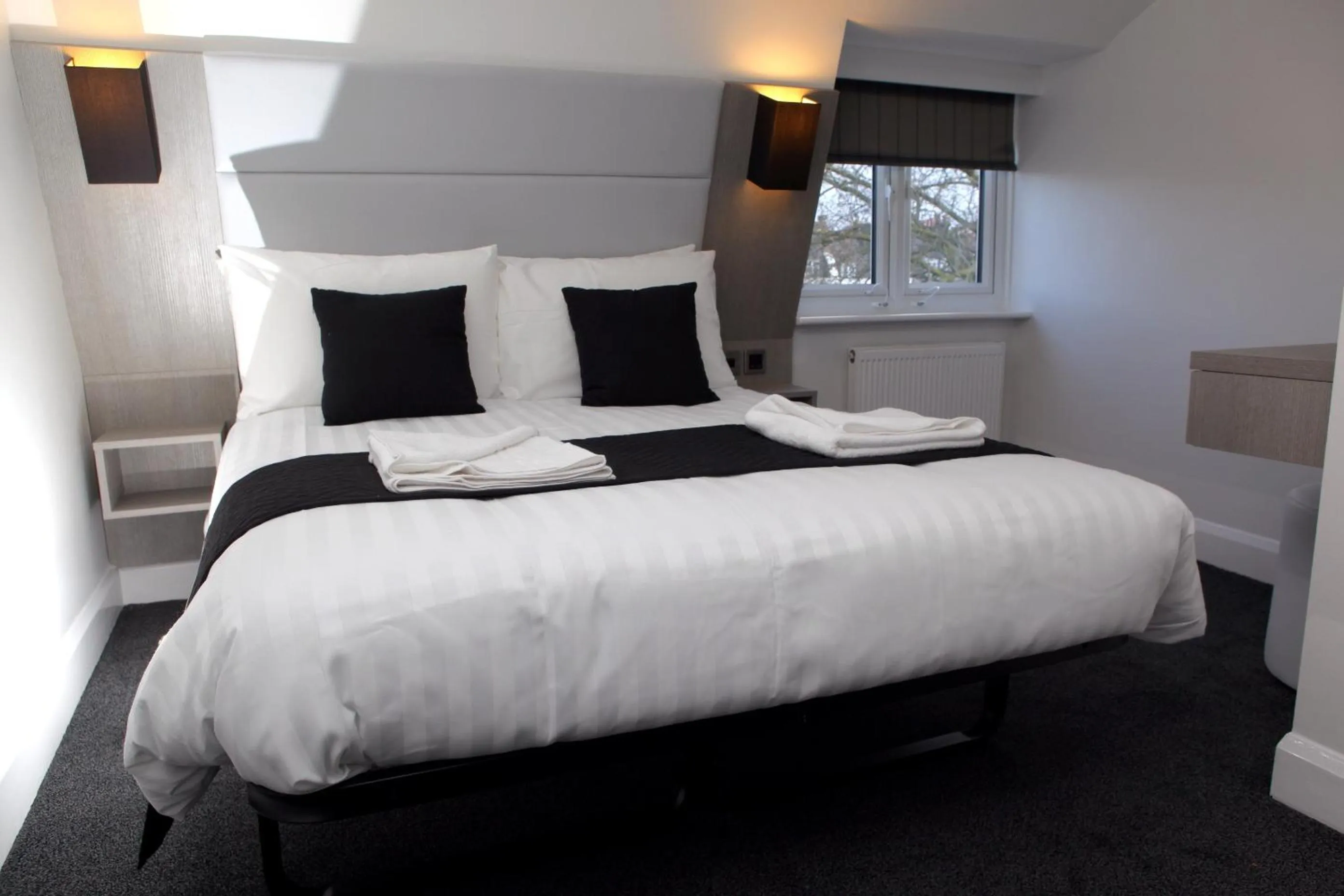 Photo of the whole room, Bed in The Omega Hotel