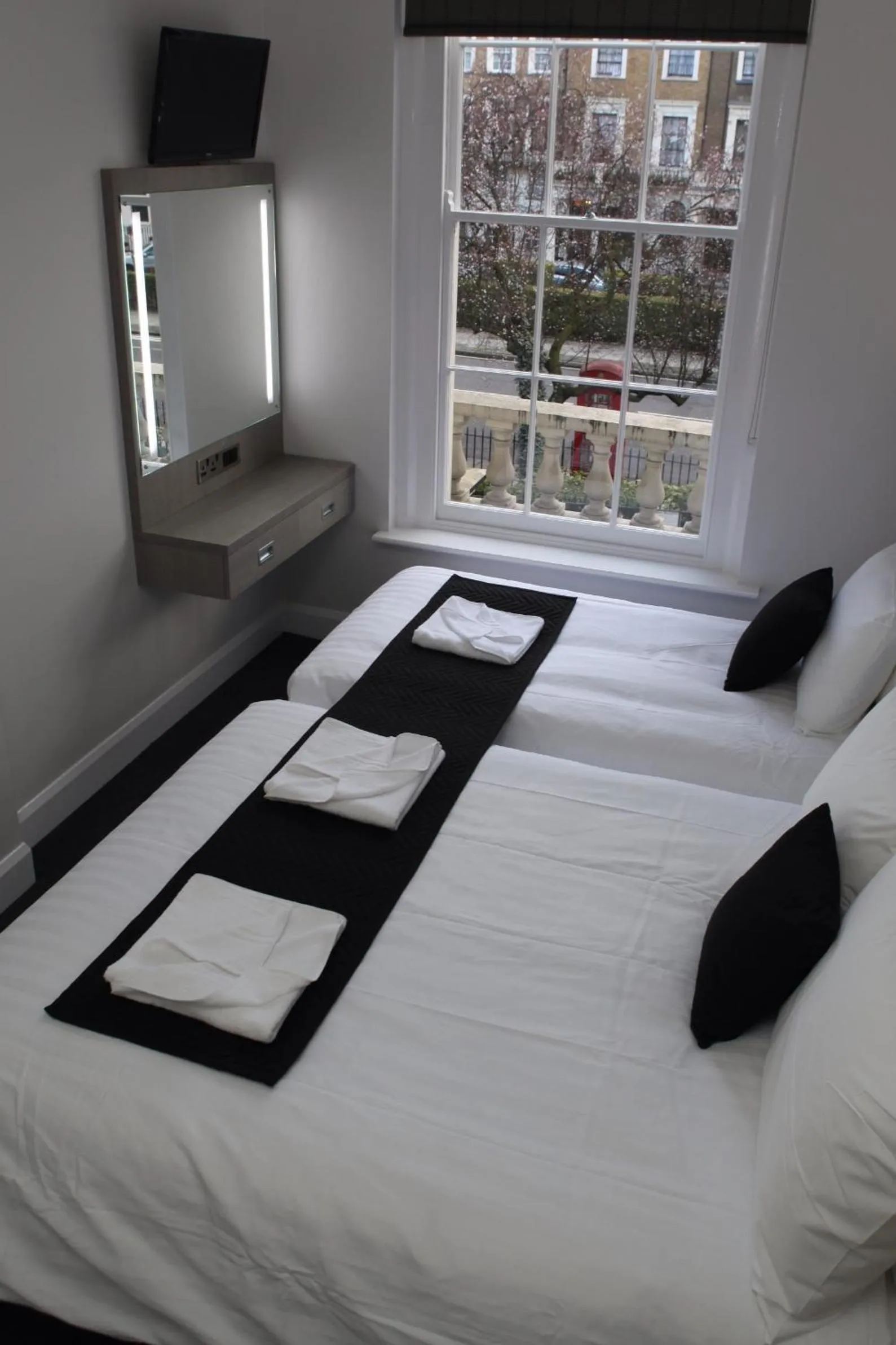 Photo of the whole room, Bed in The Omega Hotel