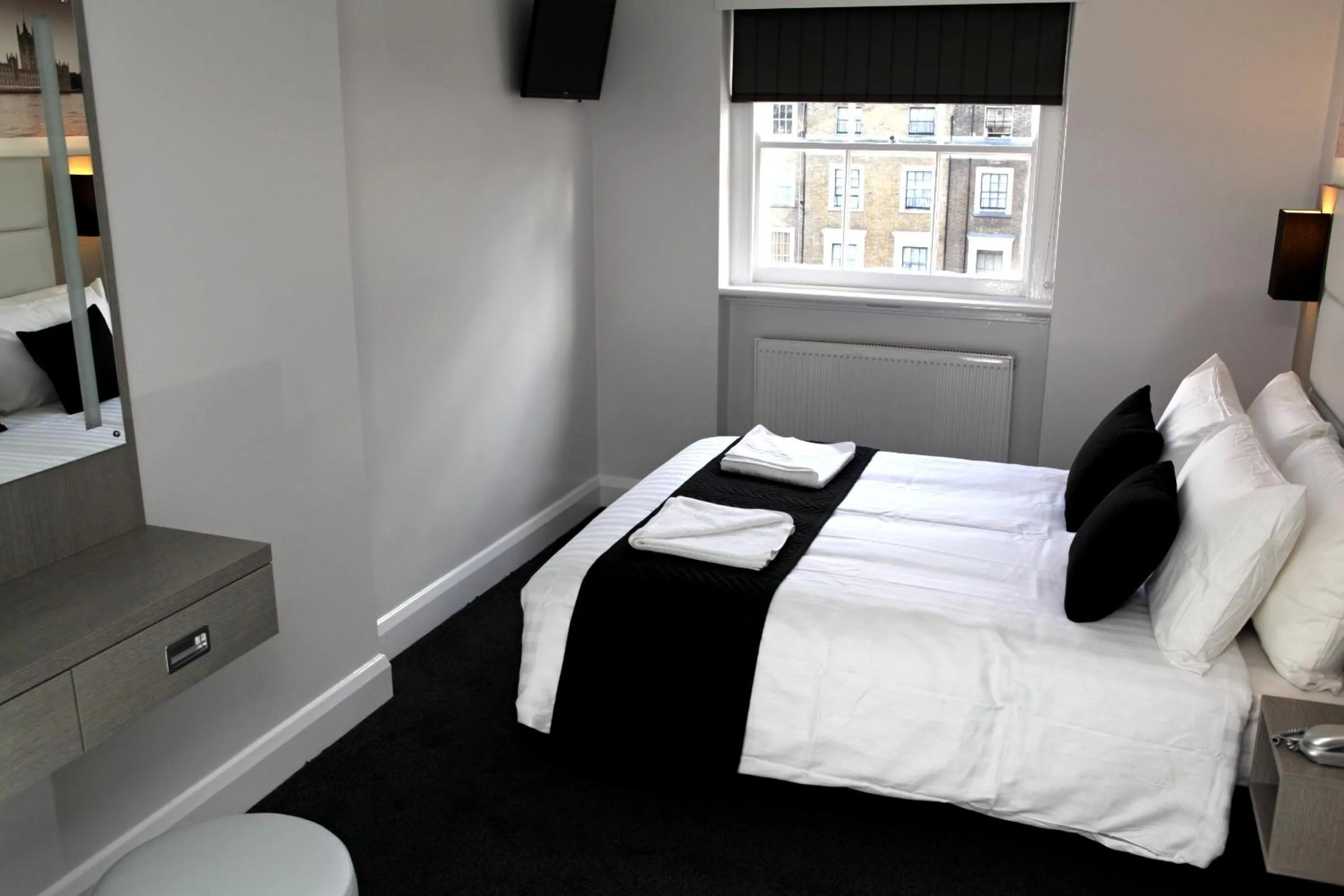 Photo of the whole room, Bed in The Omega Hotel