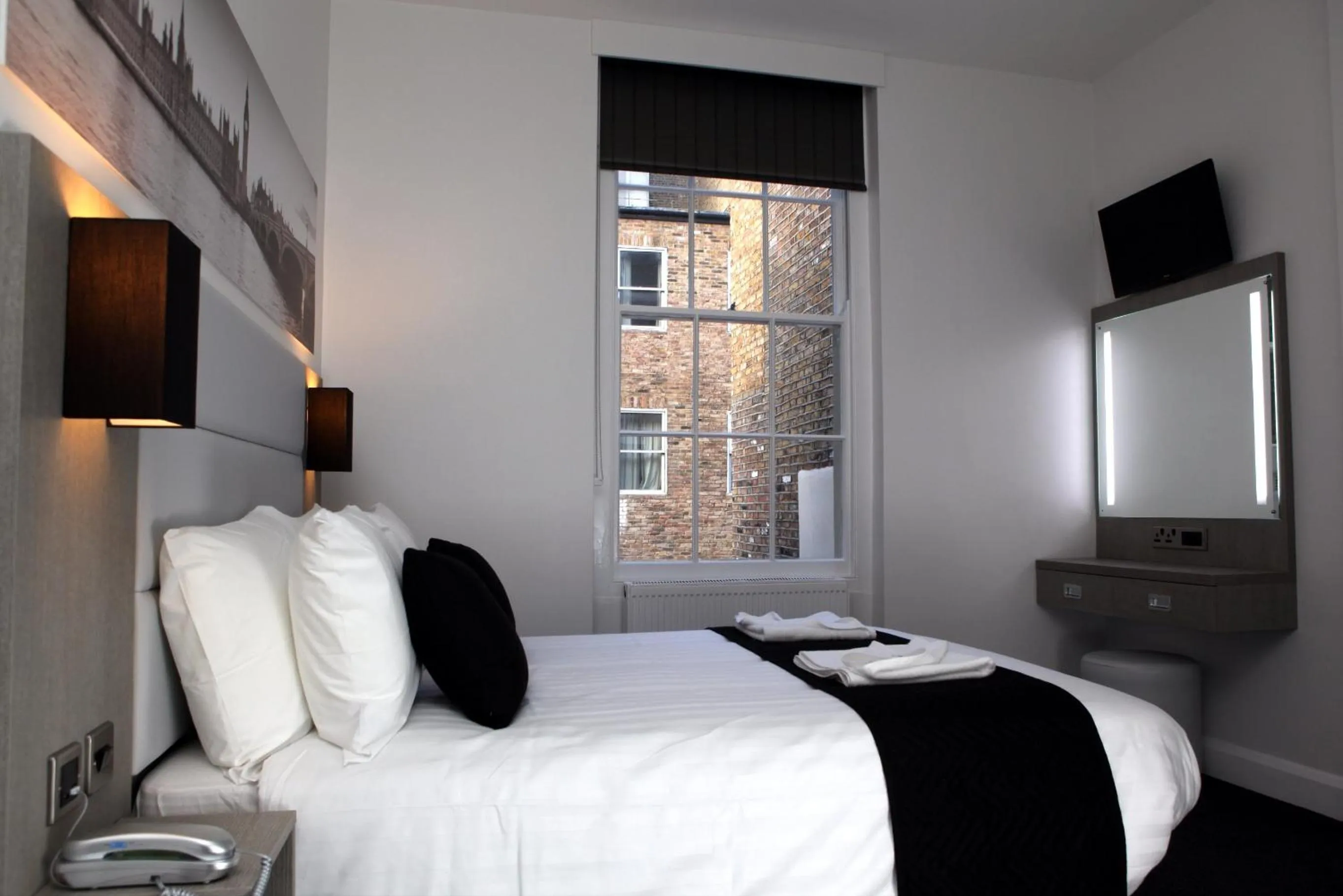 Photo of the whole room, Bed in The Omega Hotel