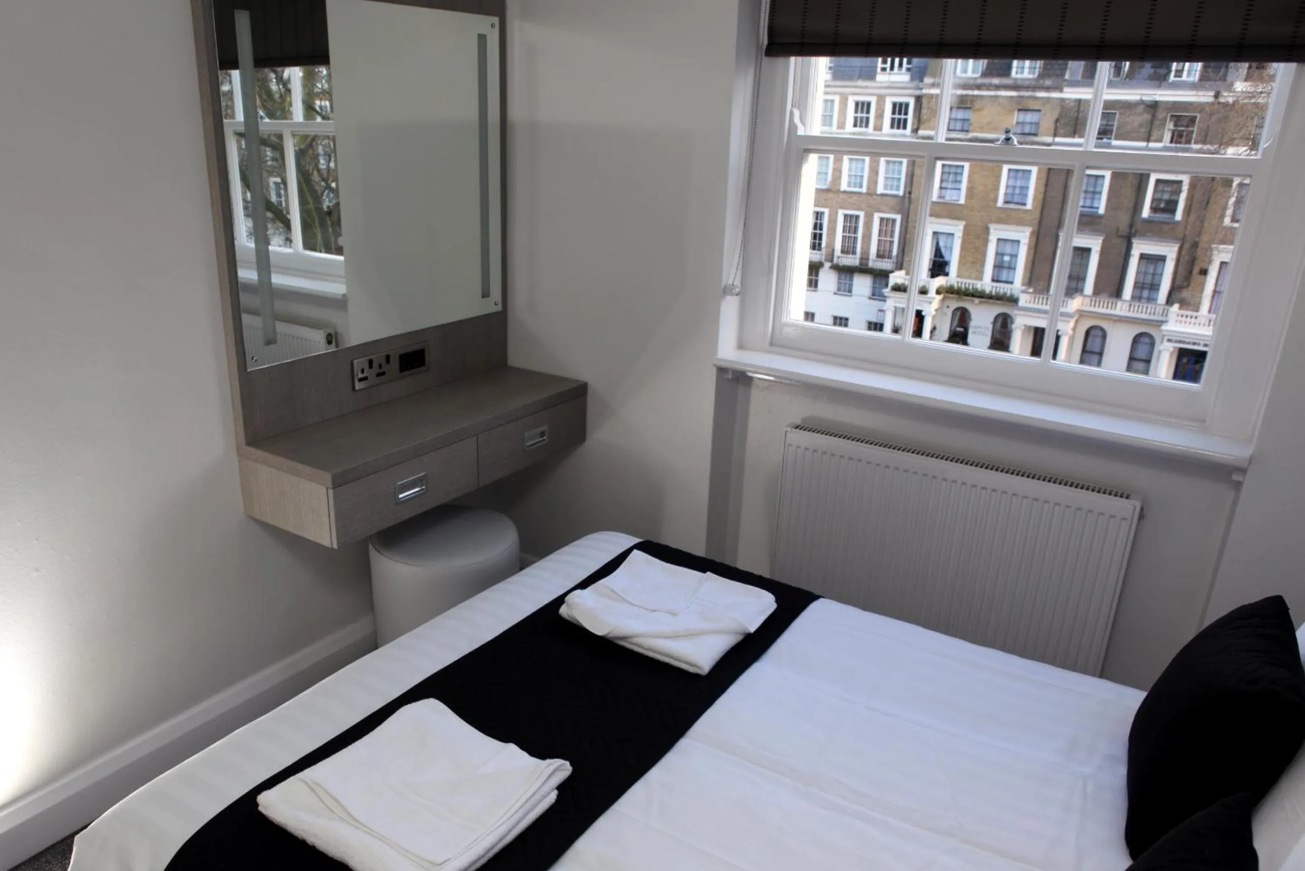 View (from property/room), Bed in The Omega Hotel