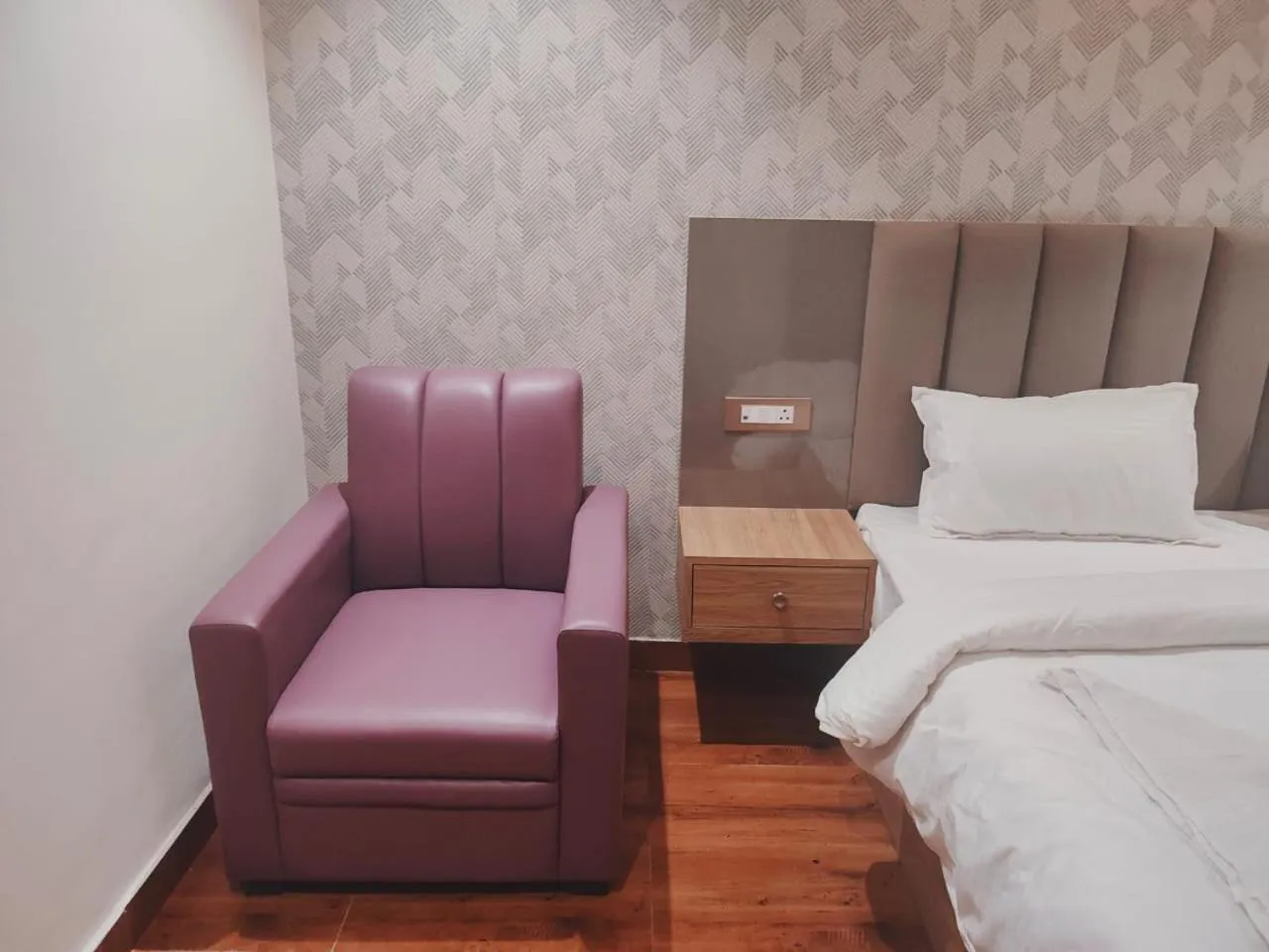 Bed in Hotel Sharma Regency