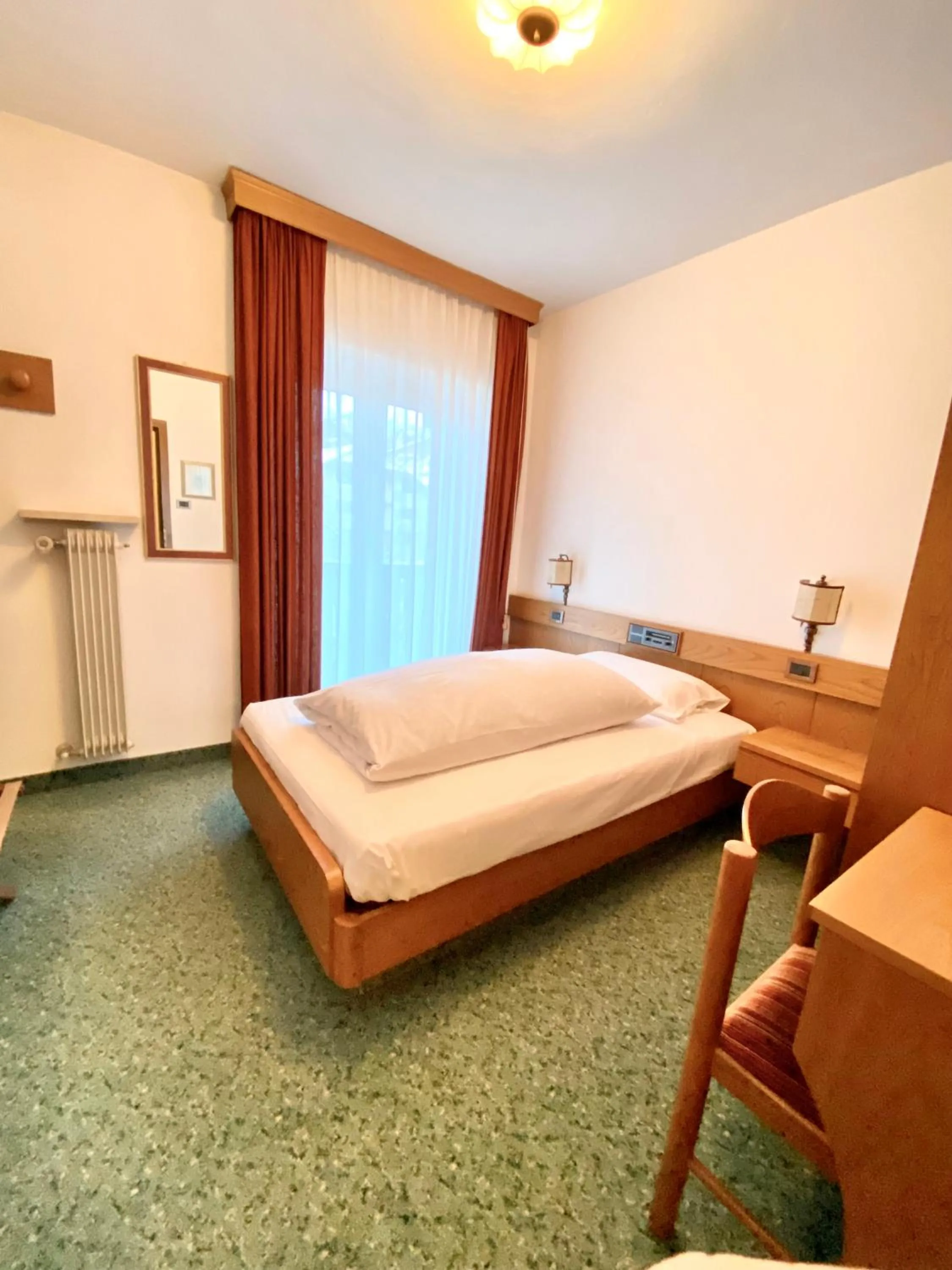Bedroom, Bed in Affittacamere Garden Cavalese