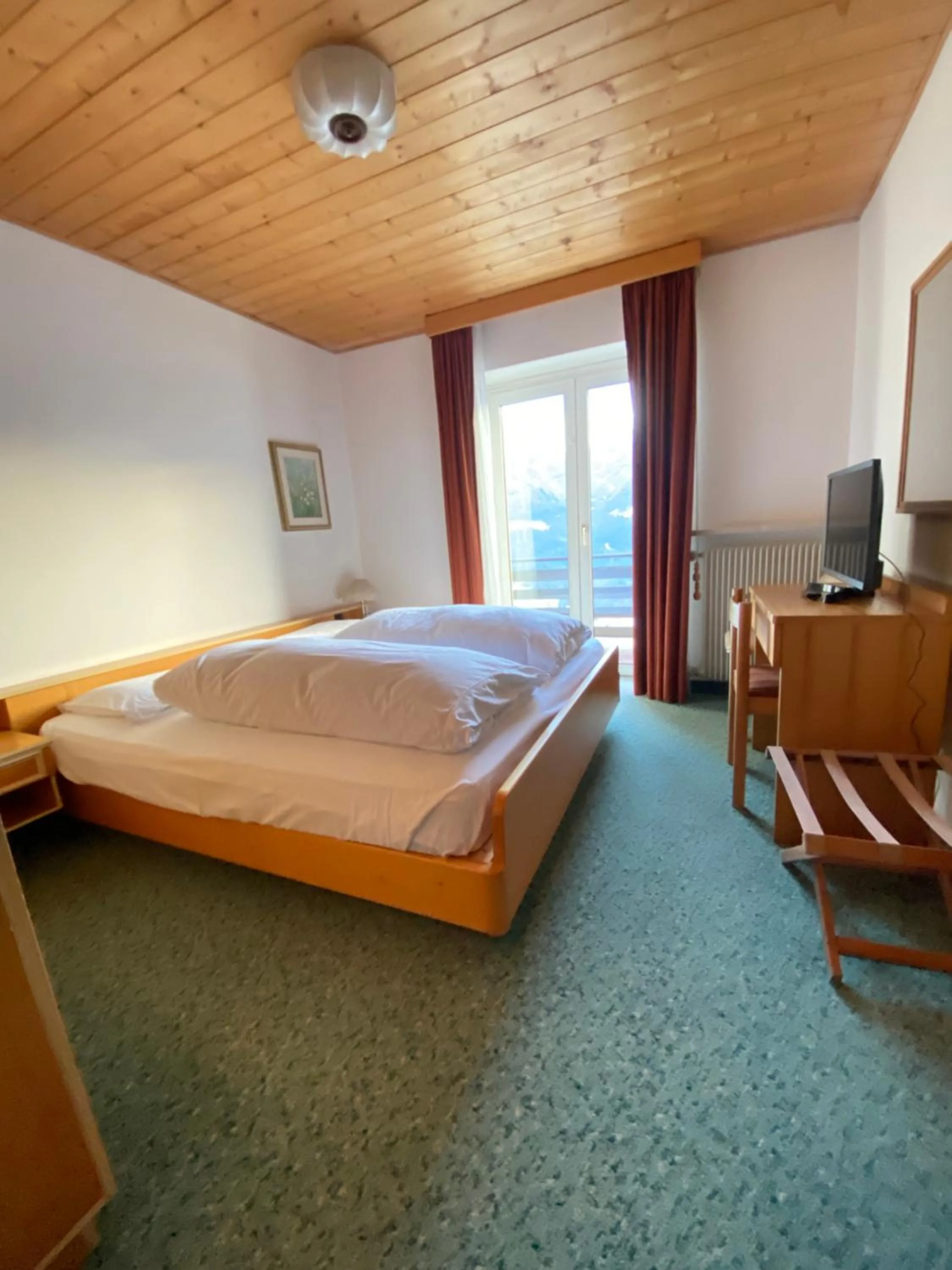 Bedroom, Bed in Affittacamere Garden Cavalese
