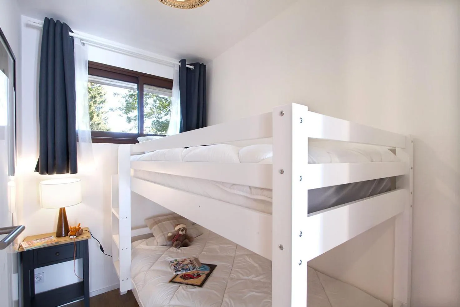 Bed in Résidence Provençal by Leavetown Vacations