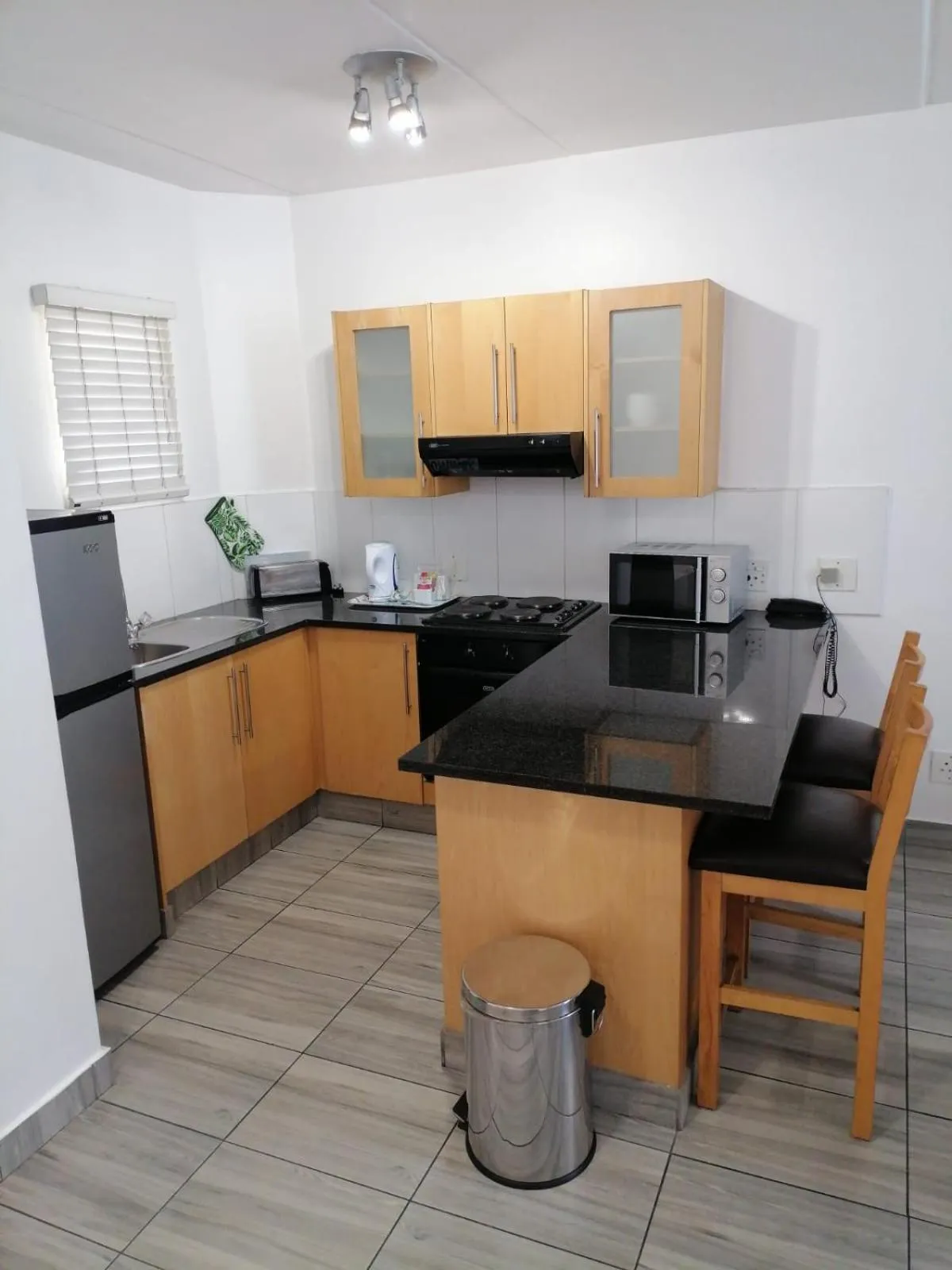 Kitchen or kitchenette in Airport Inn and Suites