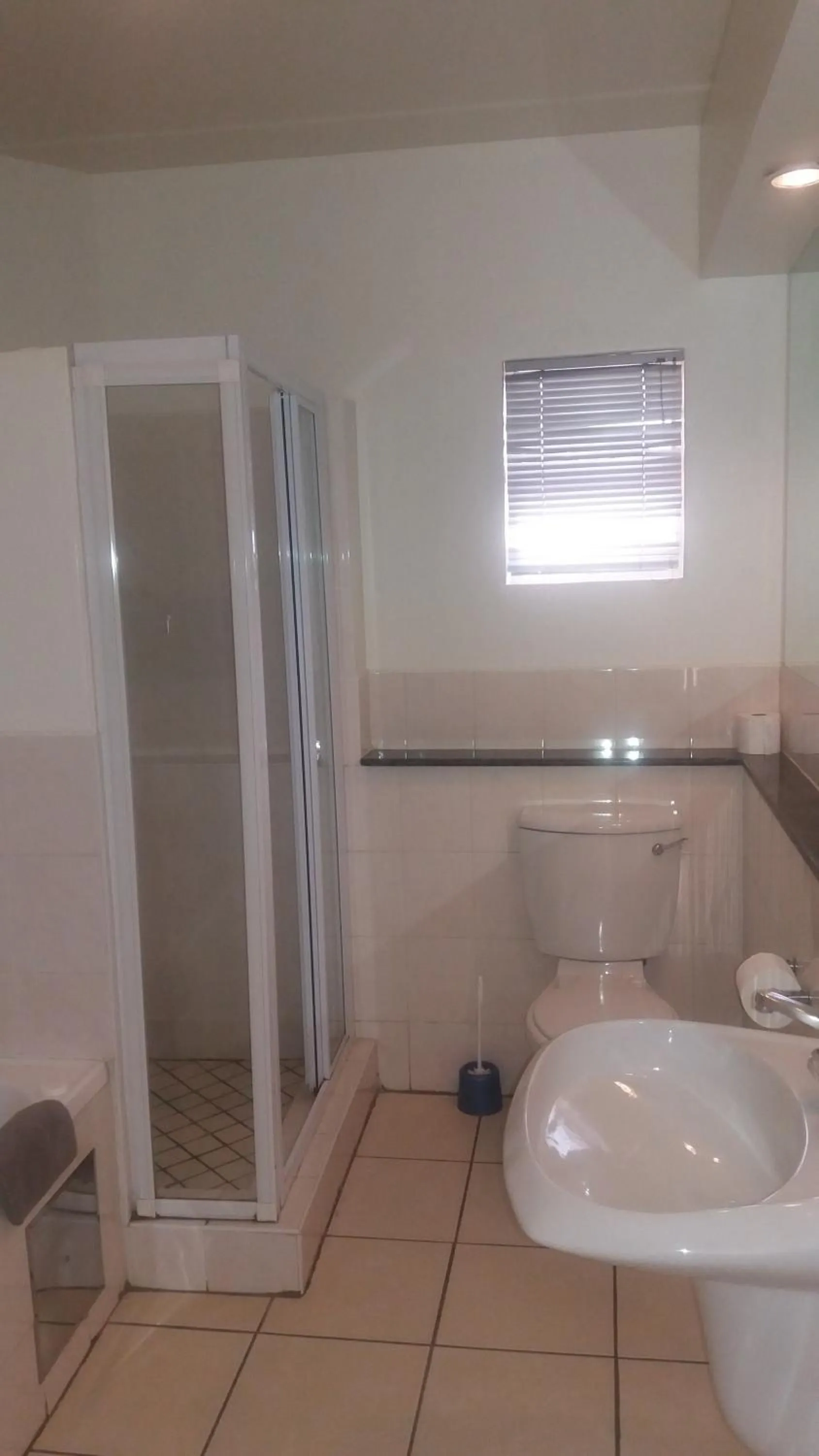 Bathroom in Airport Inn and Suites