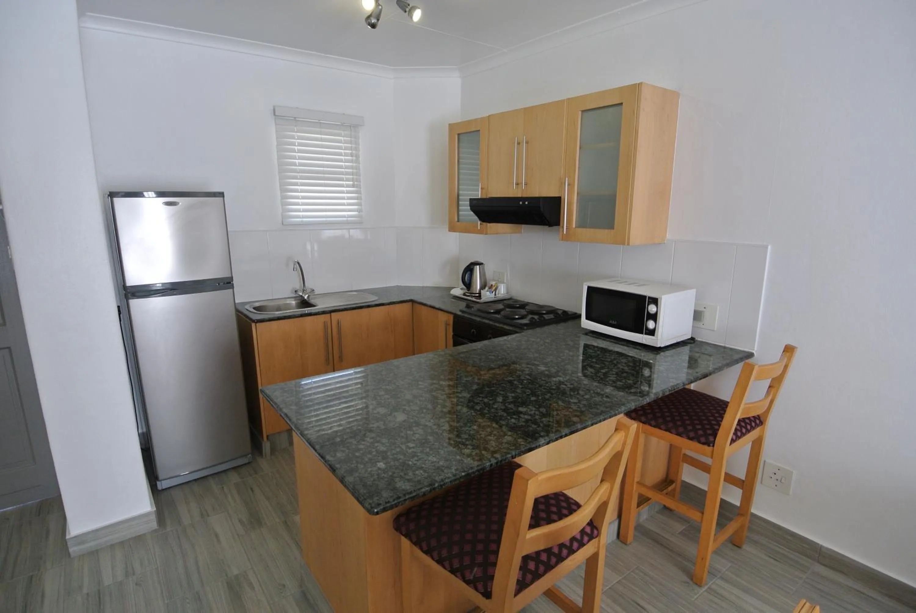 Kitchen or kitchenette in Airport Inn and Suites