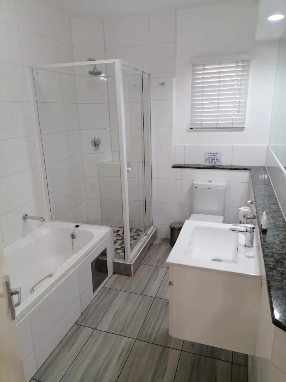 Bathroom in Airport Inn and Suites