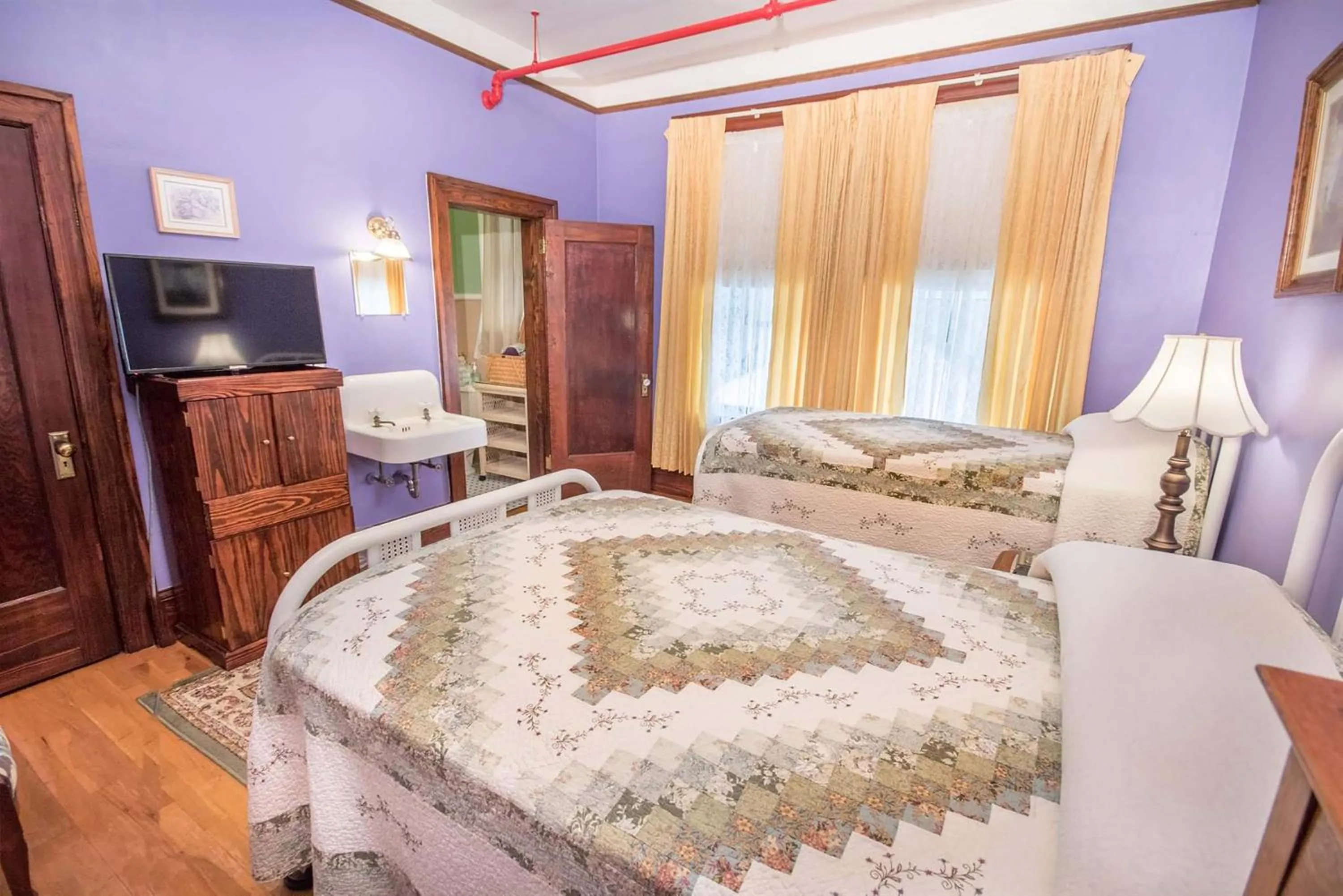 Bed in The Edgewater Hotel