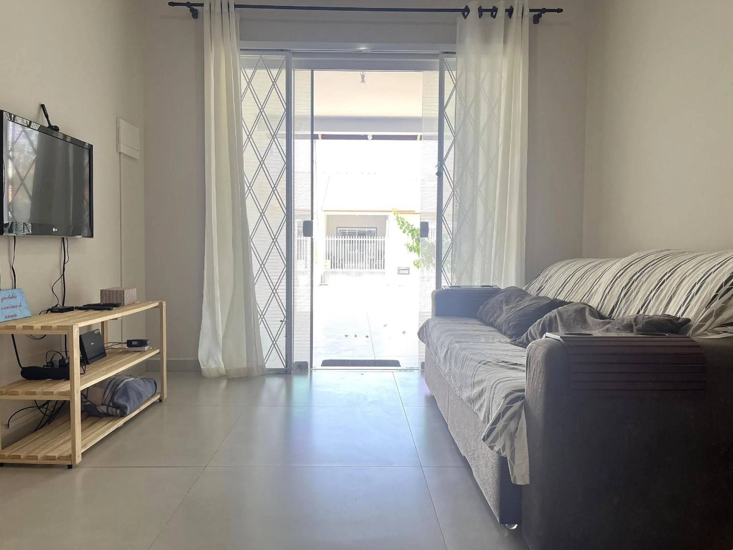 Living room in Apenas 700m do mar e 25min do Beto Carrero