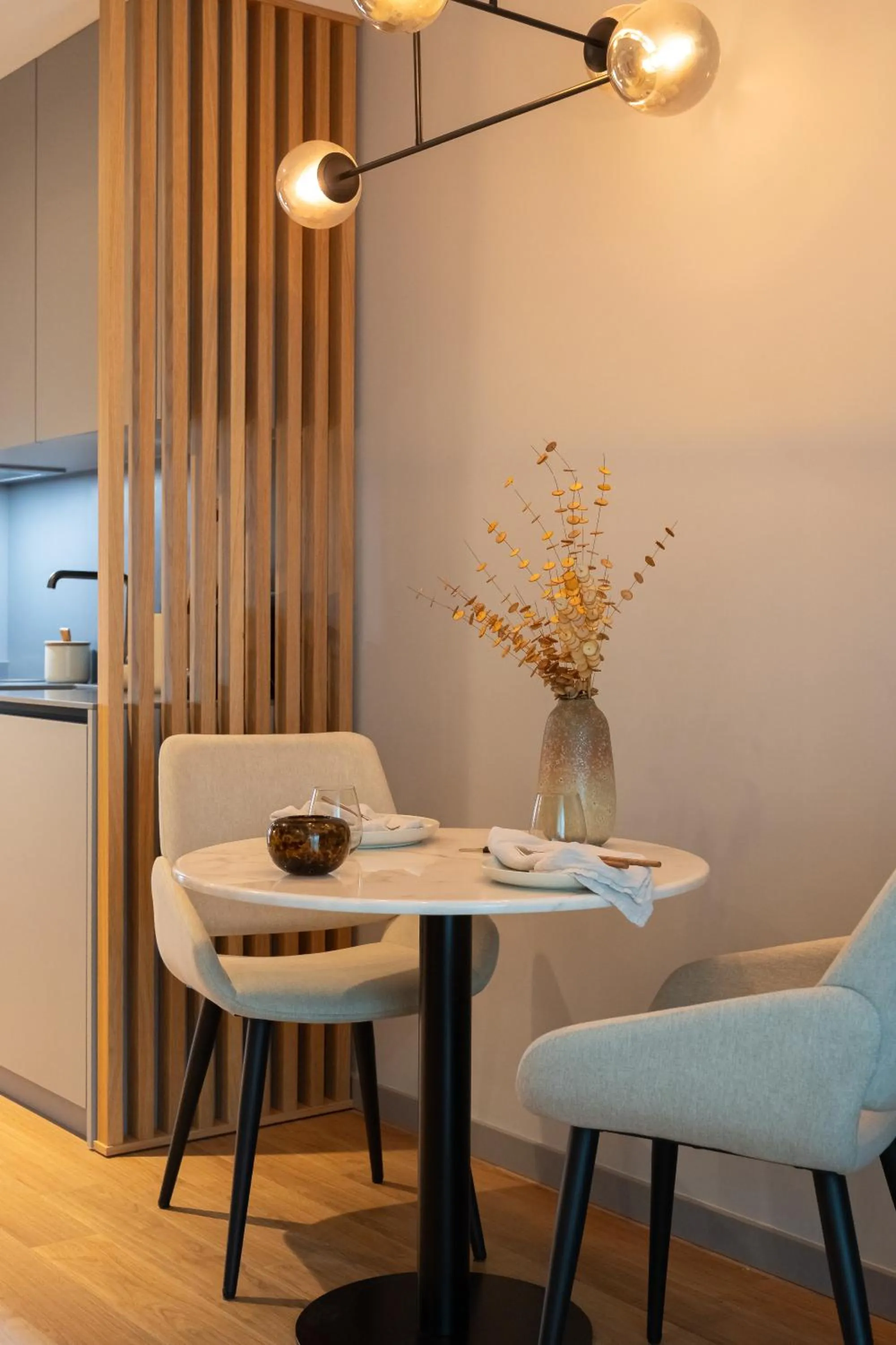Dining area in Nôma Living Icon Apartments