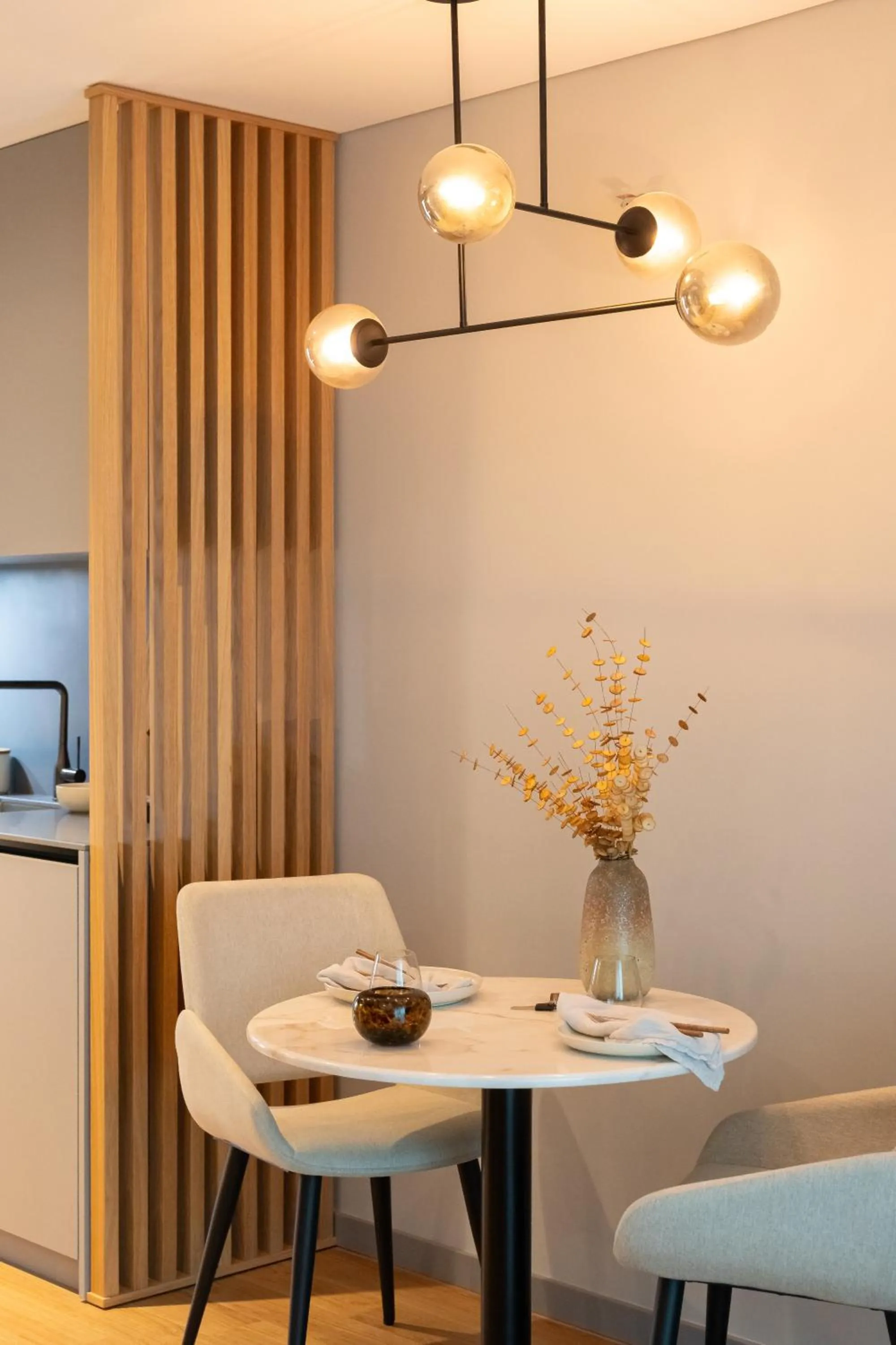 Dining area in Nôma Living Icon Apartments