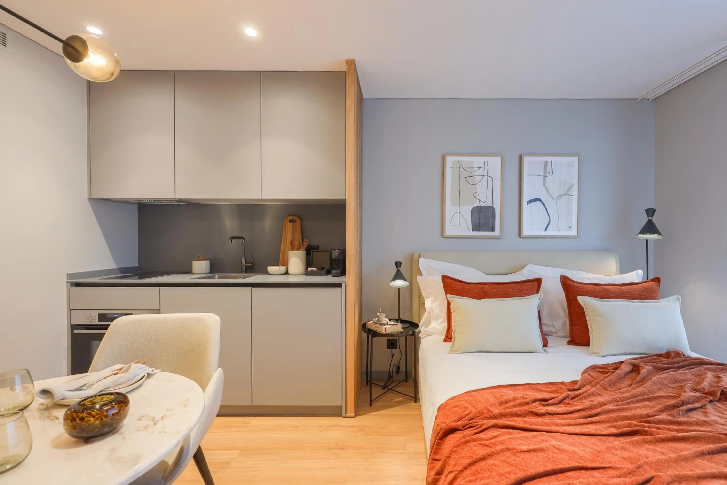 Dining area, Bed in Nôma Living Icon Apartments