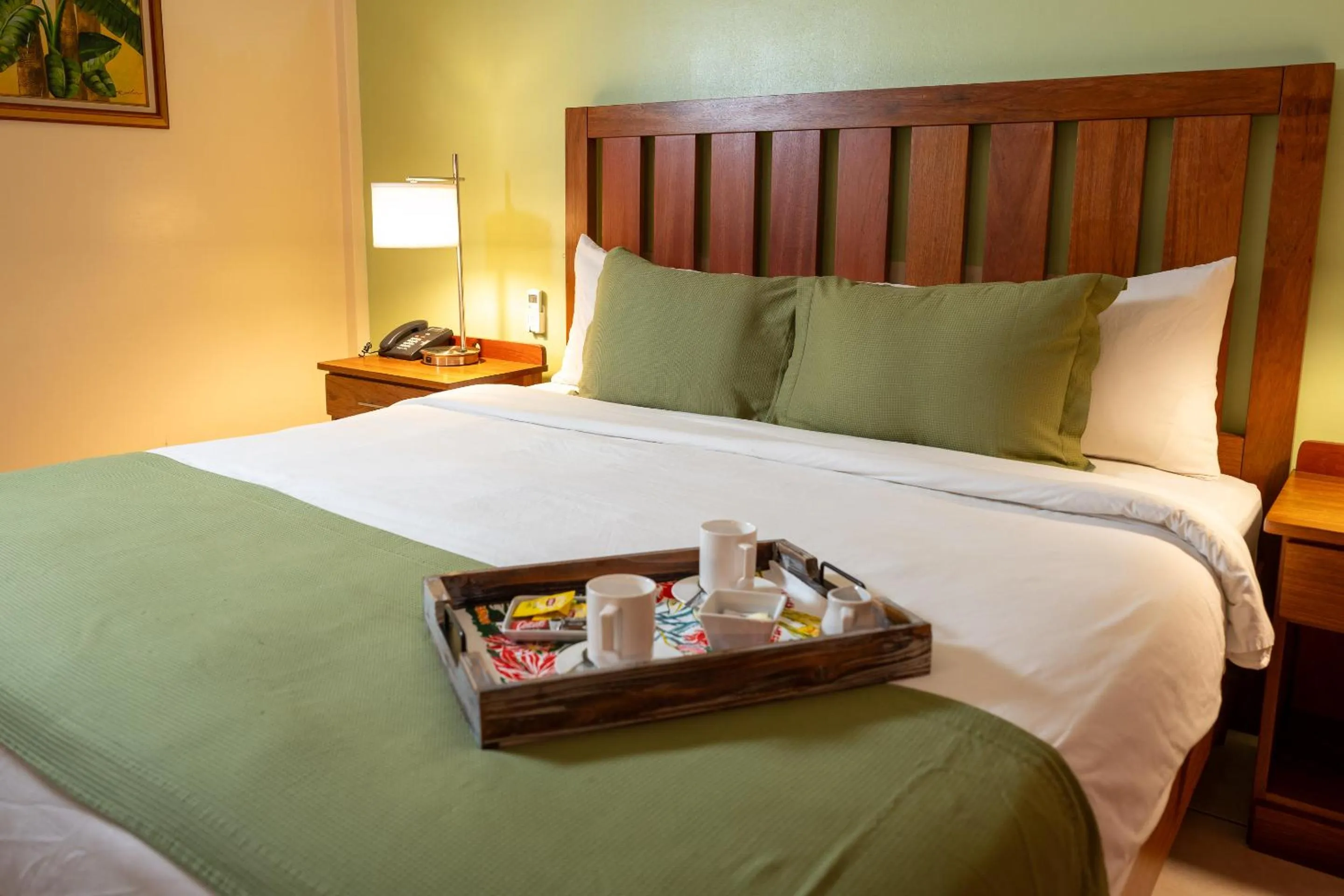 Bed in Grand Coastal Hotel