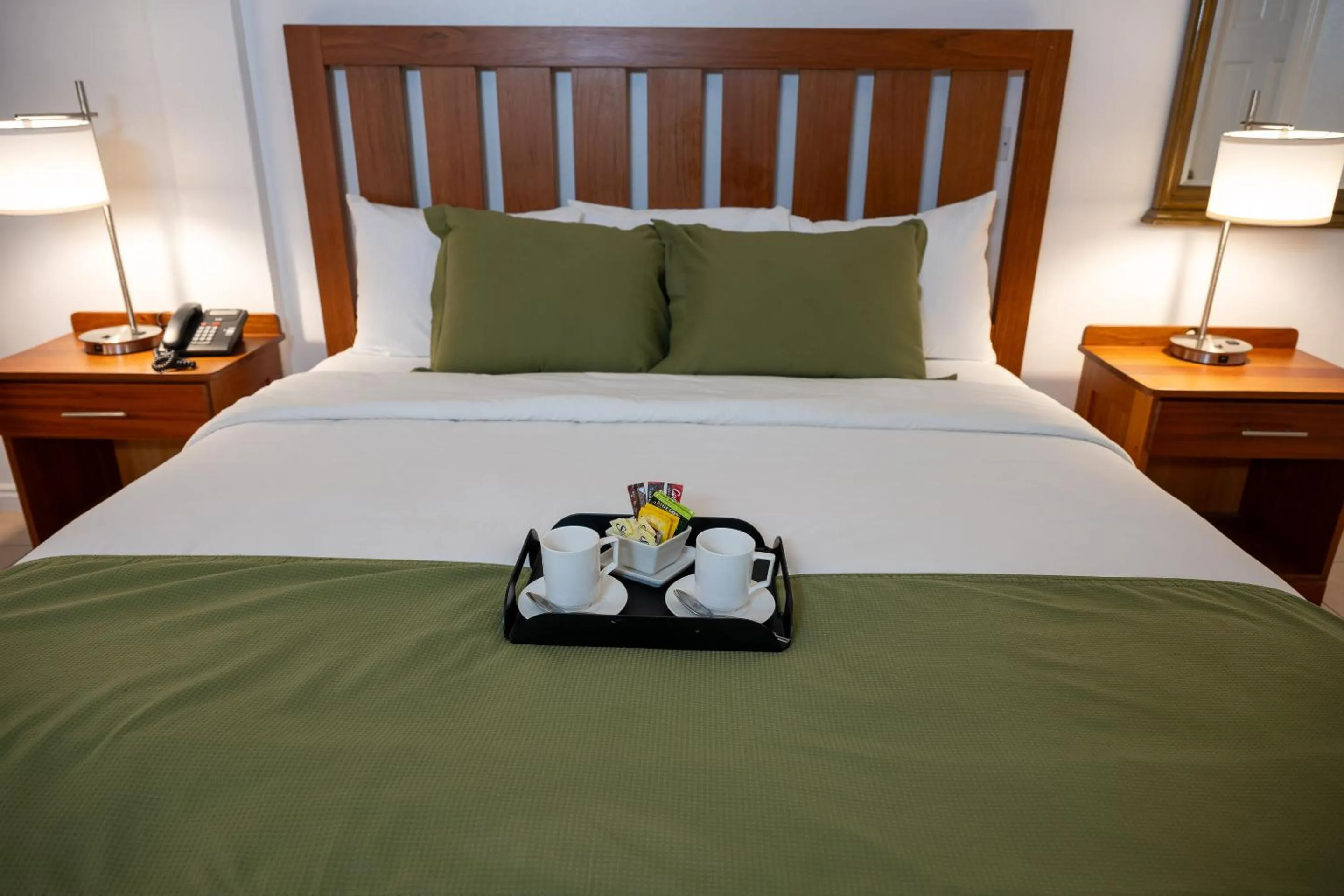 Bed in Grand Coastal Hotel
