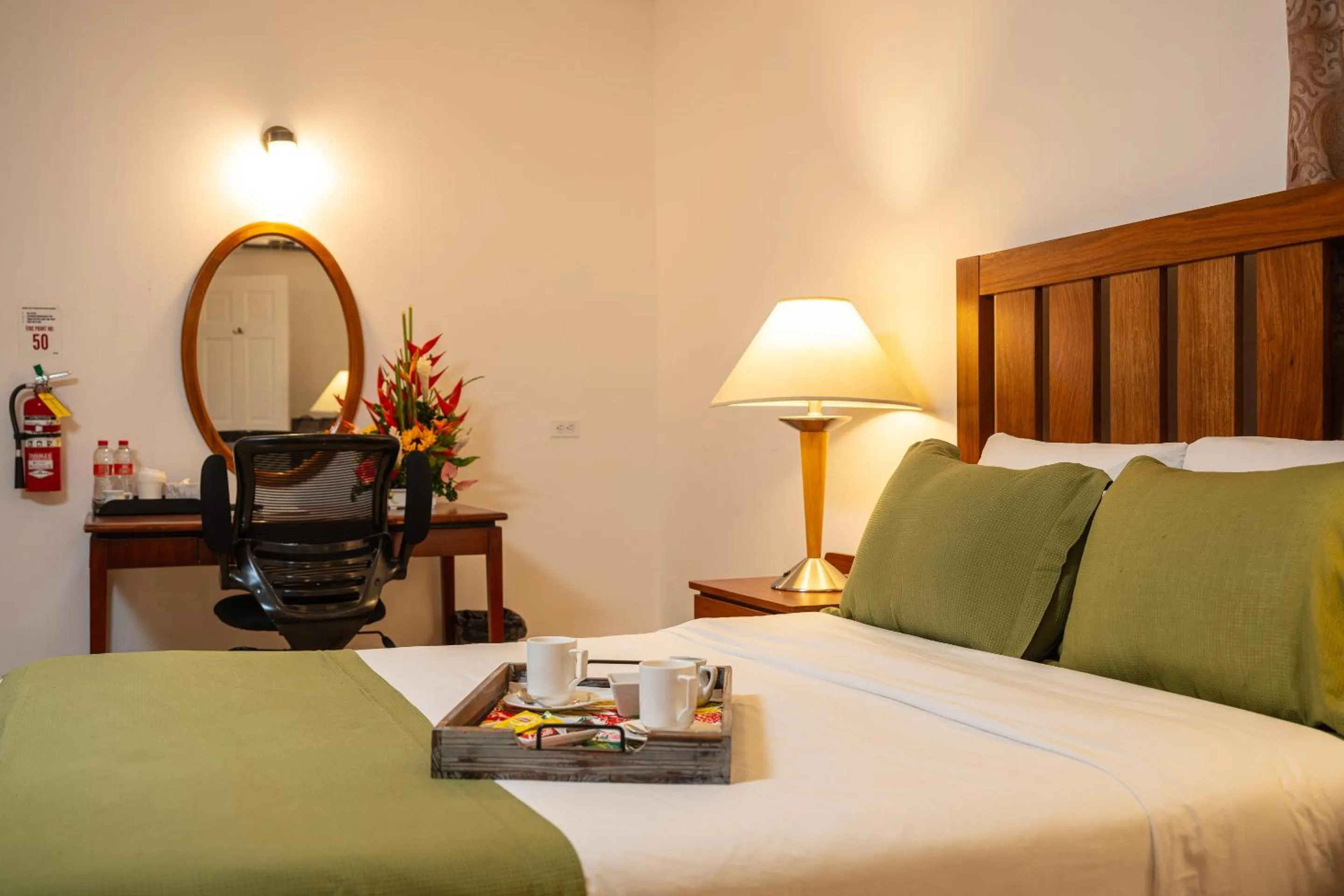 Bed in Grand Coastal Hotel