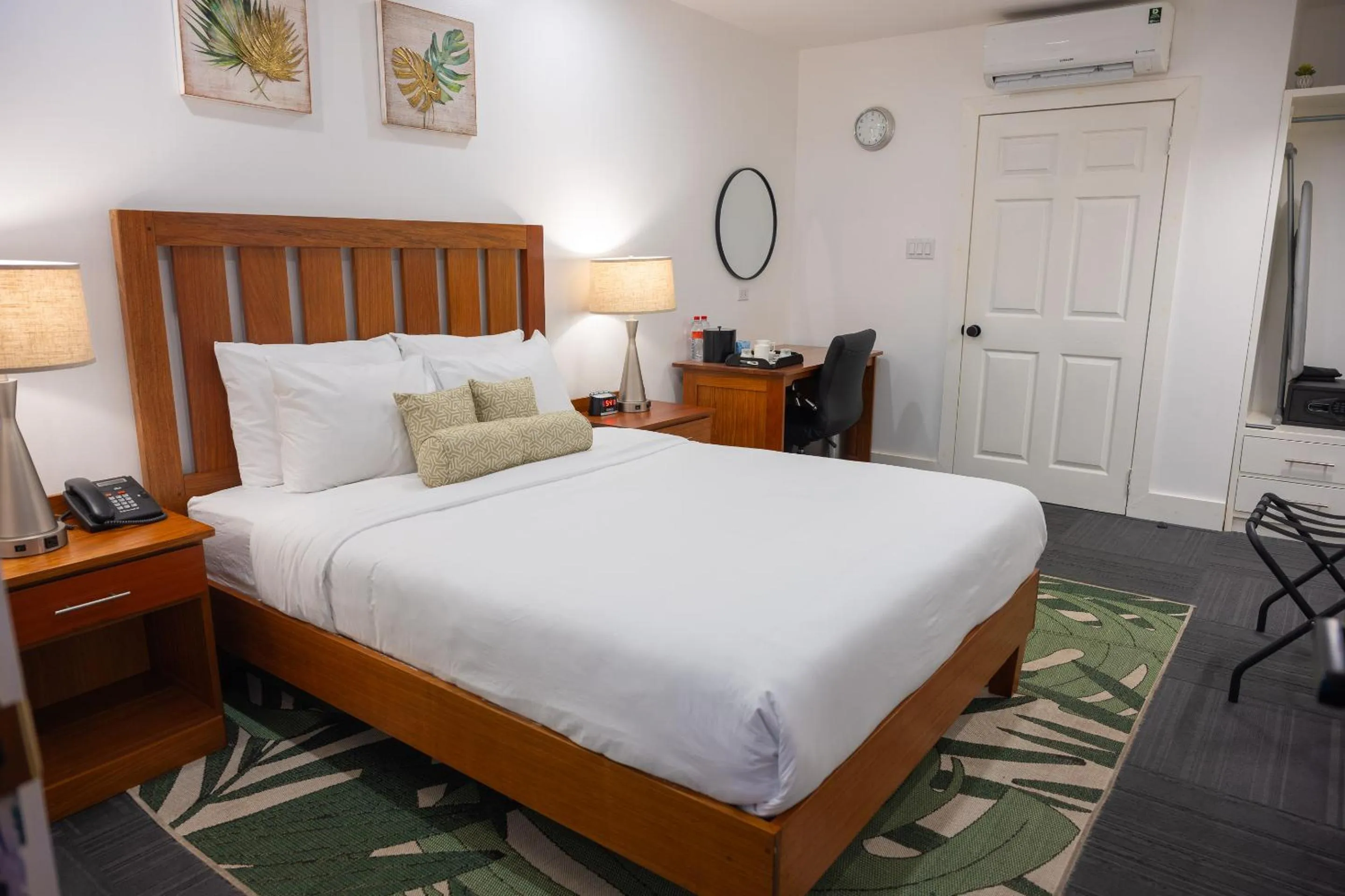 Bed in Grand Coastal Hotel