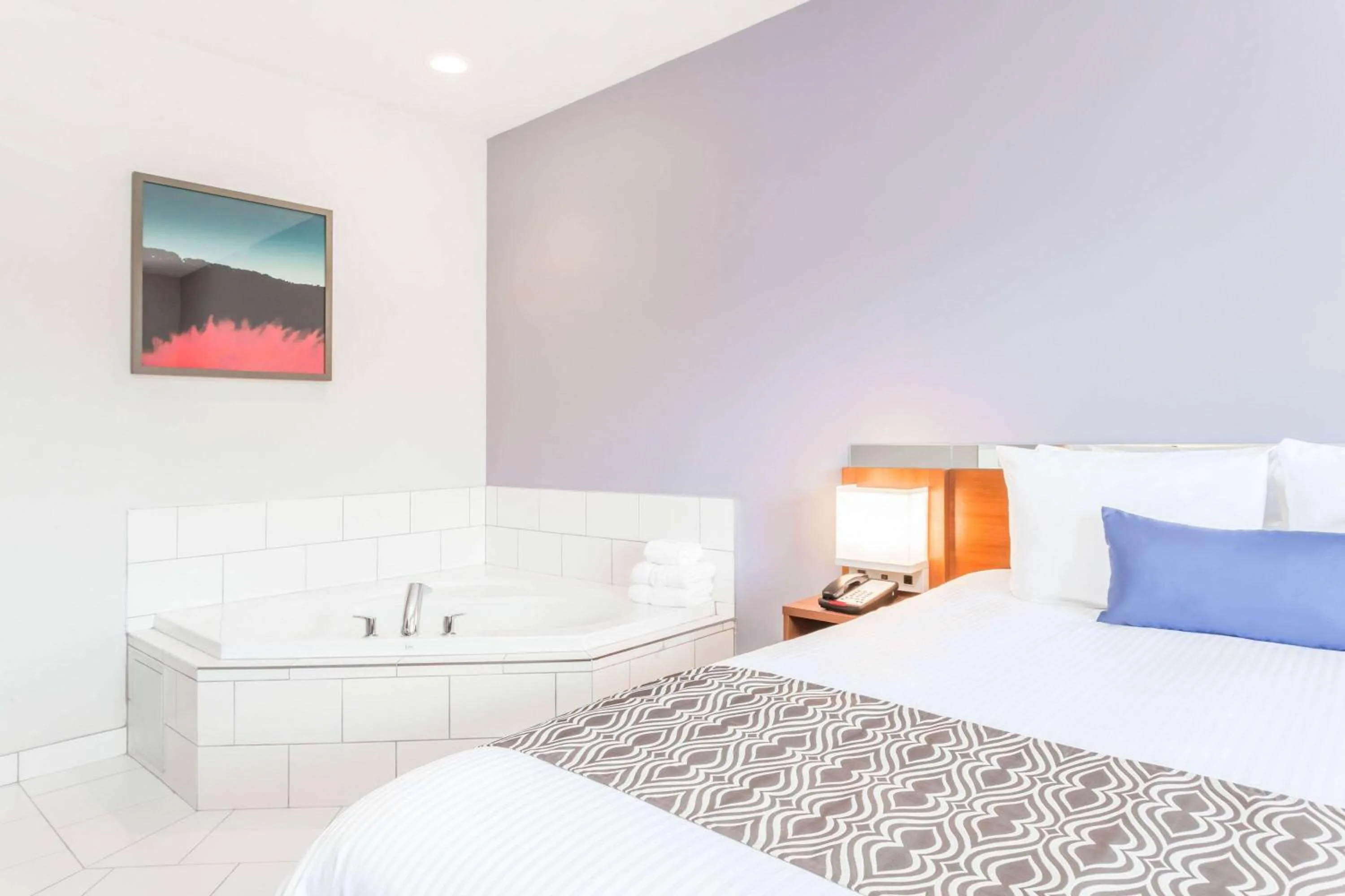 Photo of the whole room, Bed in Microtel Inn & Suites Sault Ste. Marie