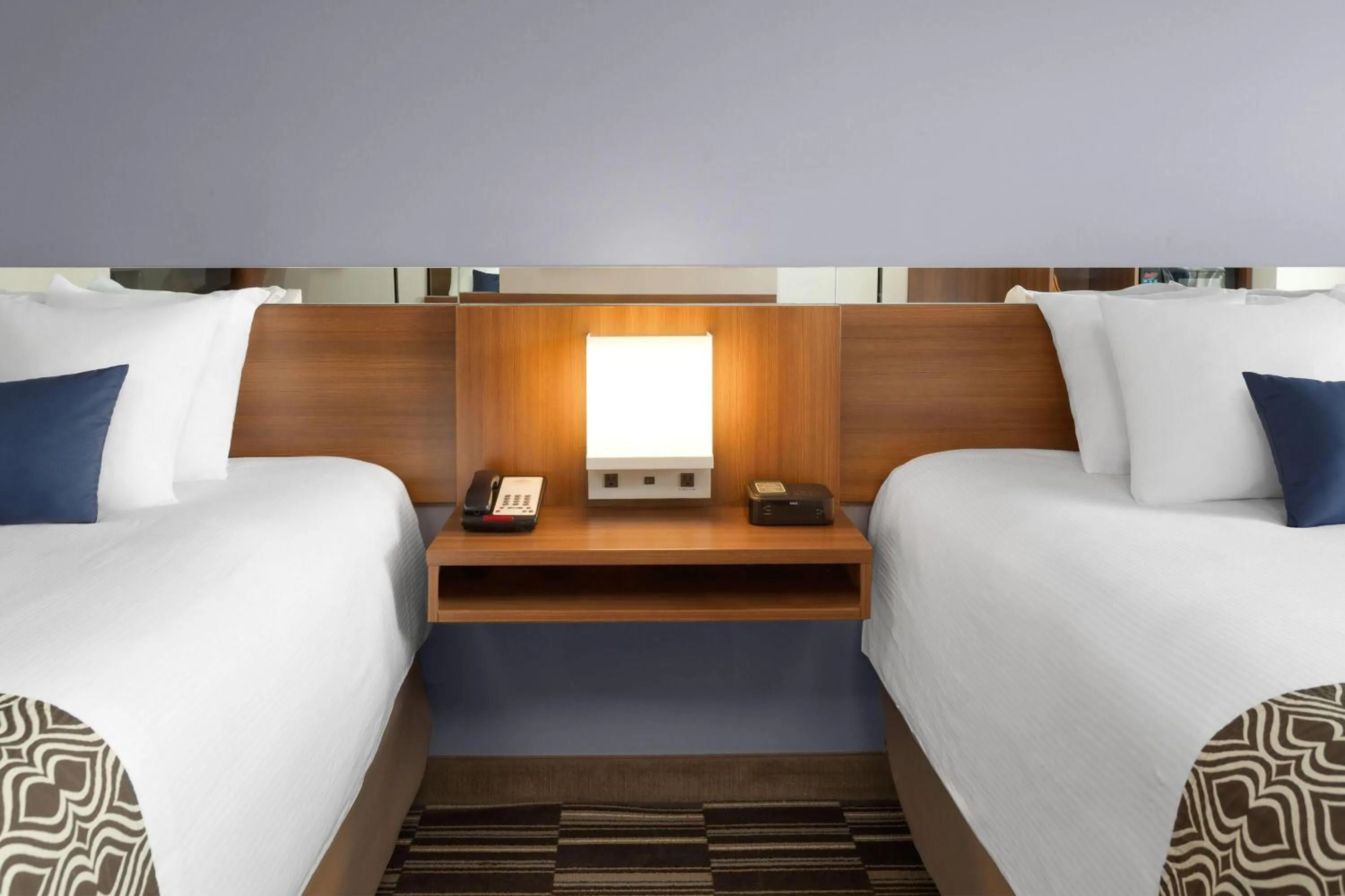 Photo of the whole room, Bed in Microtel Inn & Suites Sault Ste. Marie