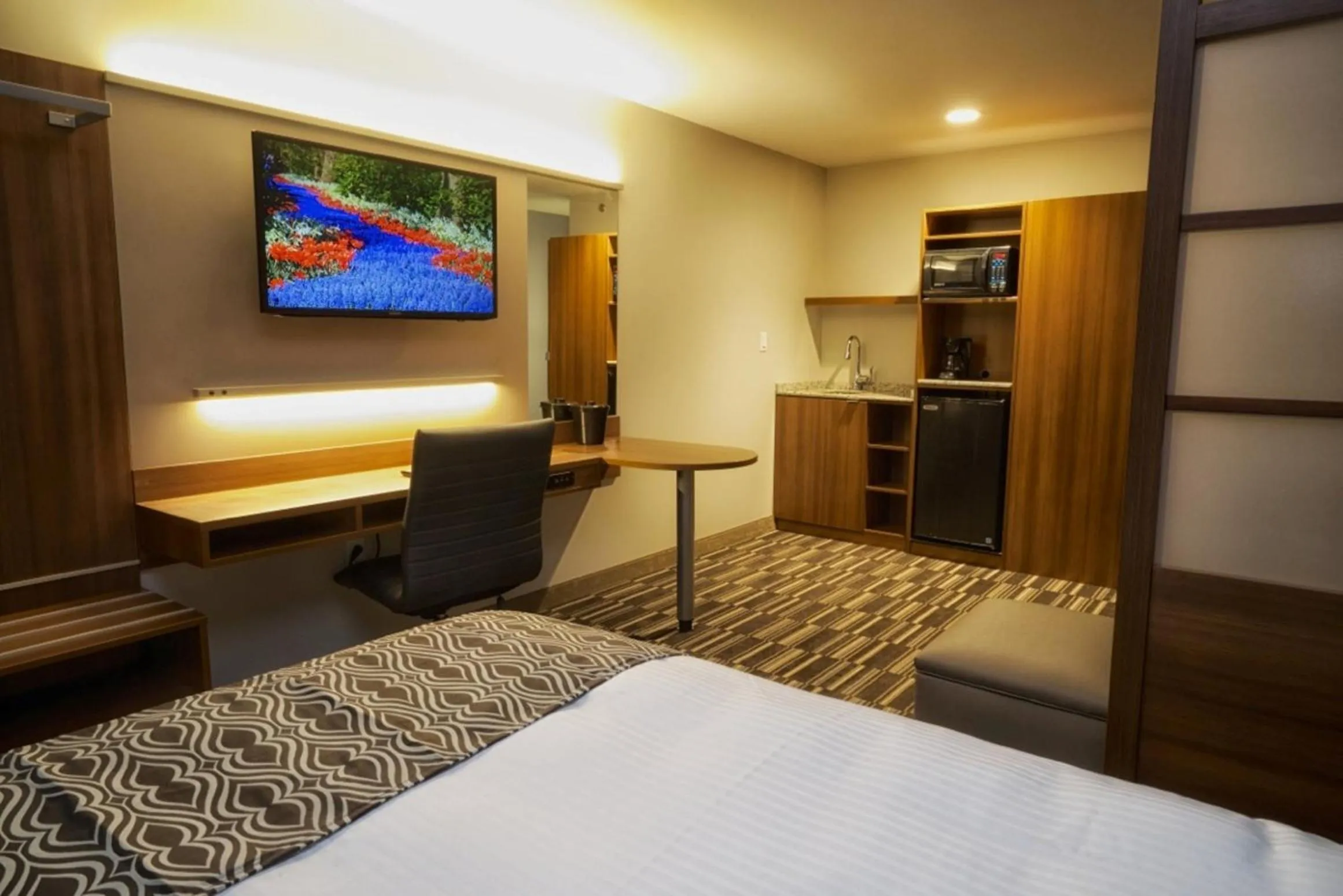 Photo of the whole room, Bed in Microtel Inn & Suites Sault Ste. Marie