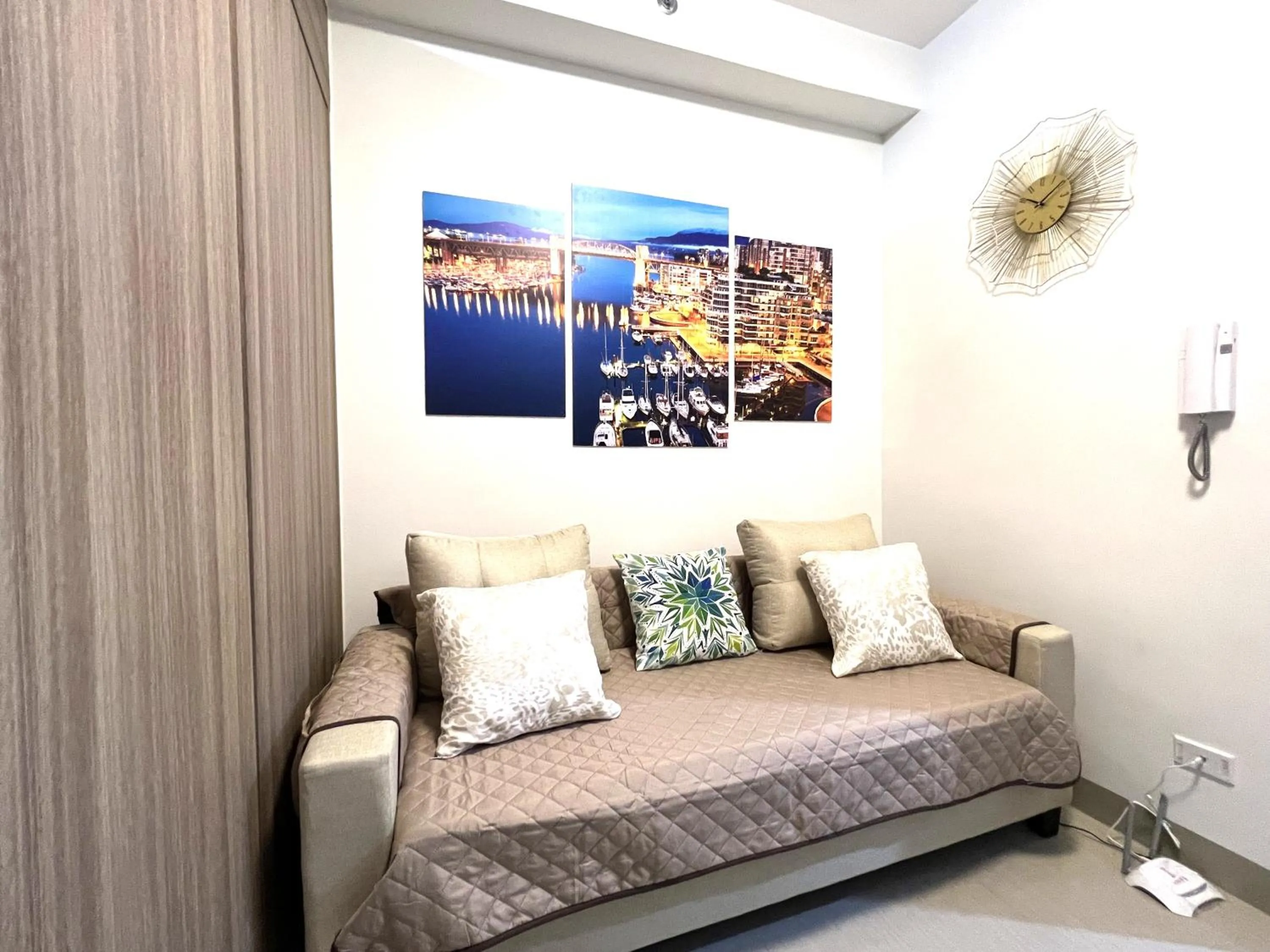 Living room, Bed in Shore Residences MOA Dynastel Staycation