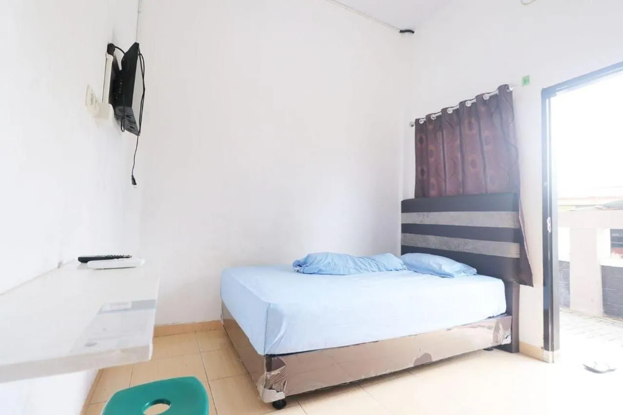 Bedroom, Bed in SPOT ON 93442 Widya Homestay SyariahNearBandara Sultan Syarif Kasim II