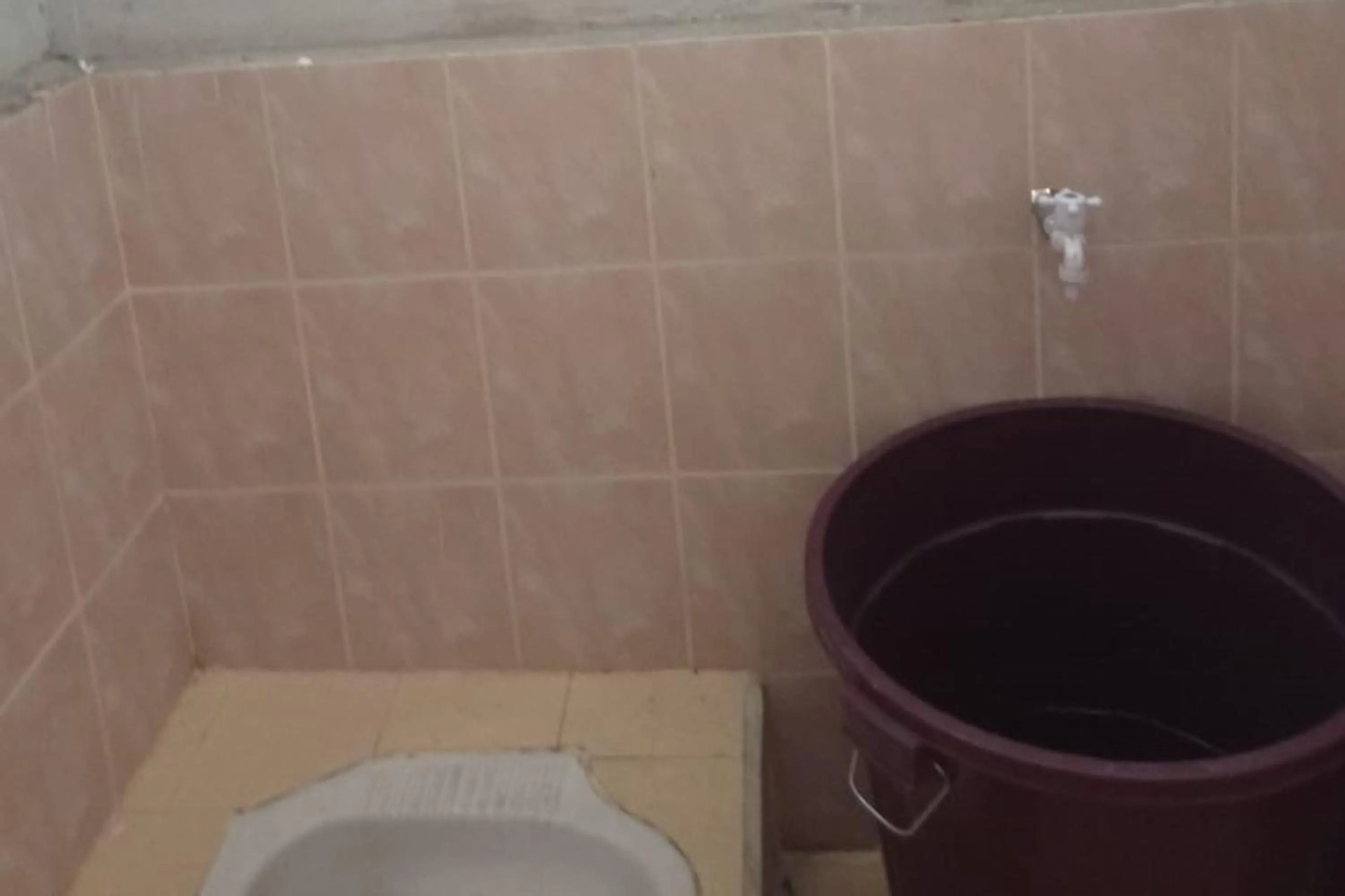 Bathroom in Hotel O Widya Homestay SyariahNearBandara Sultan Syarif Kasim II