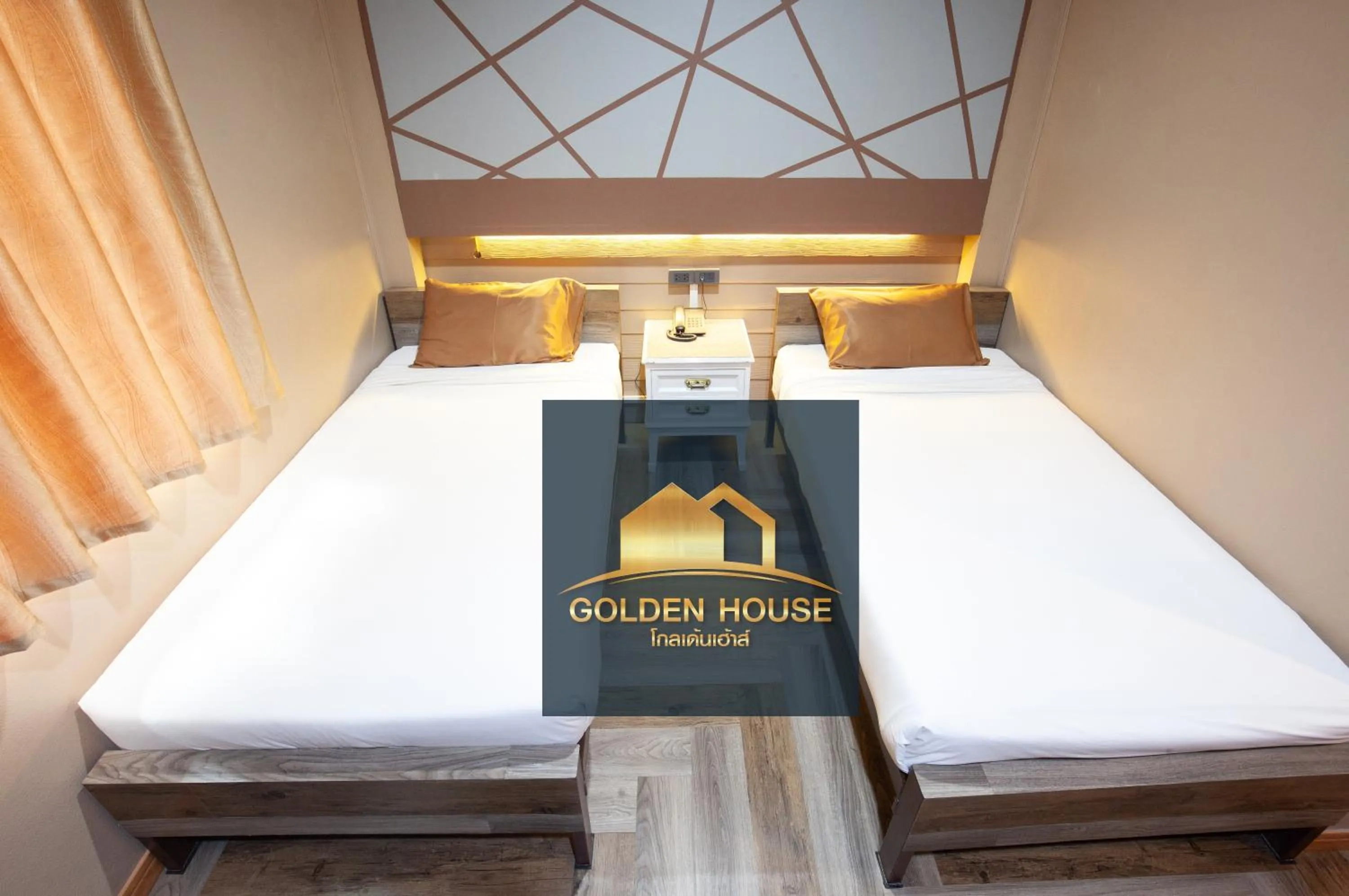 Bed in Golden House Hotel Sakaeo