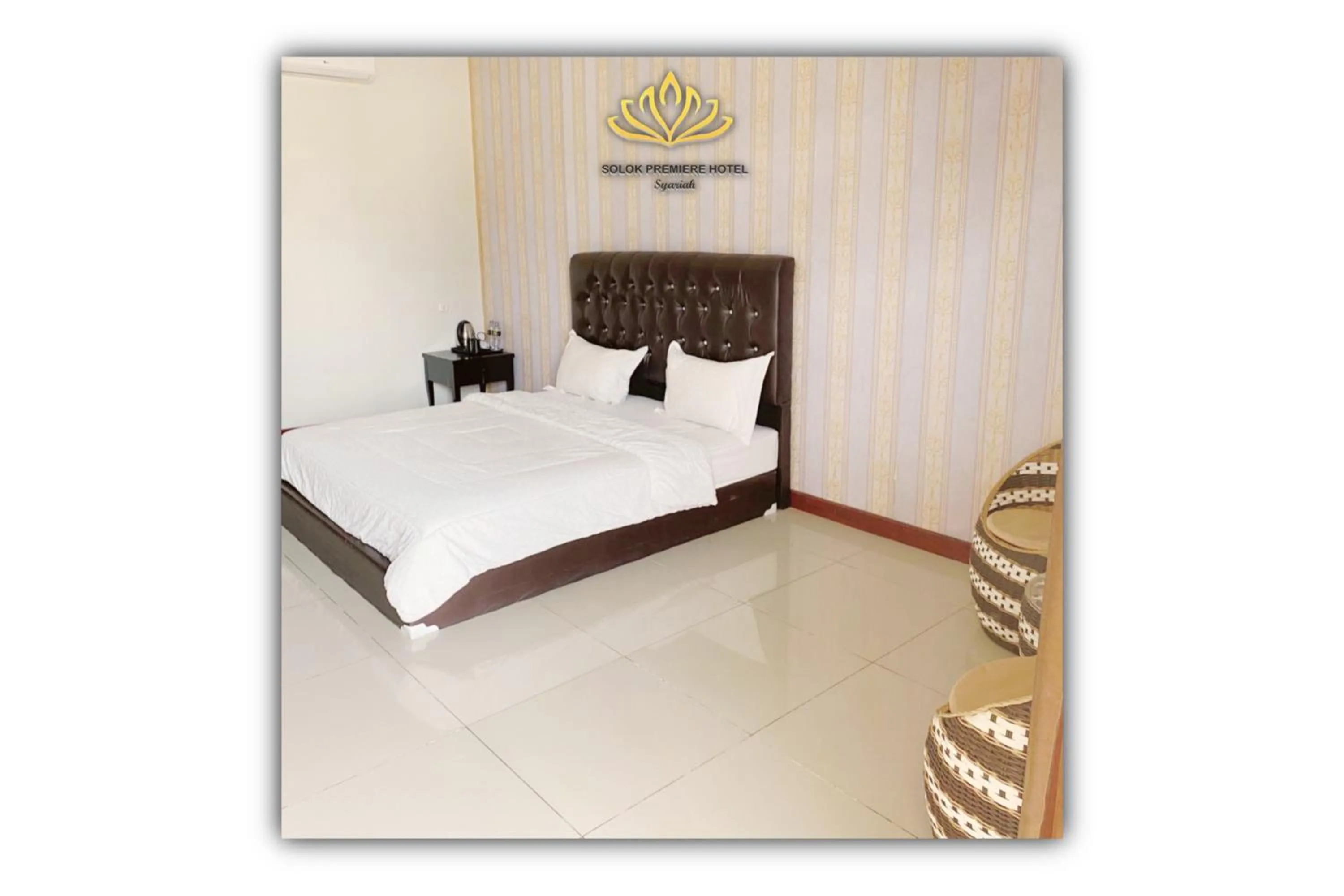 Bed in Solok Premier Hotel