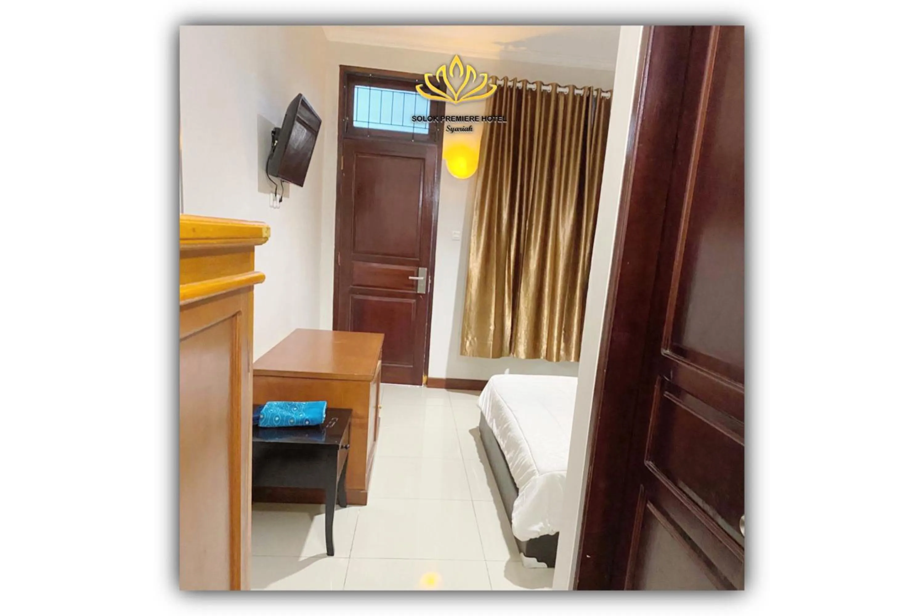 Bed in Solok Premier Hotel