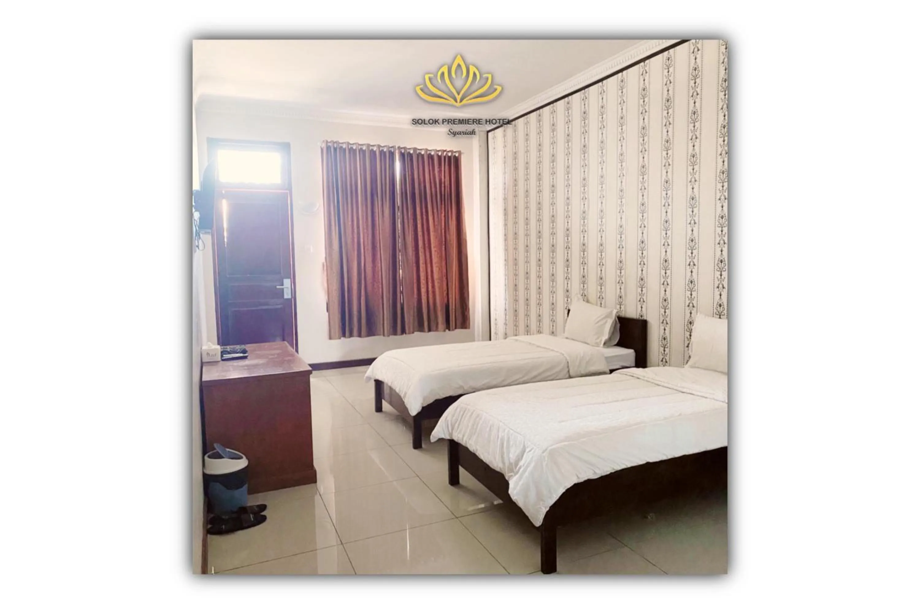 Bed in Solok Premier Hotel
