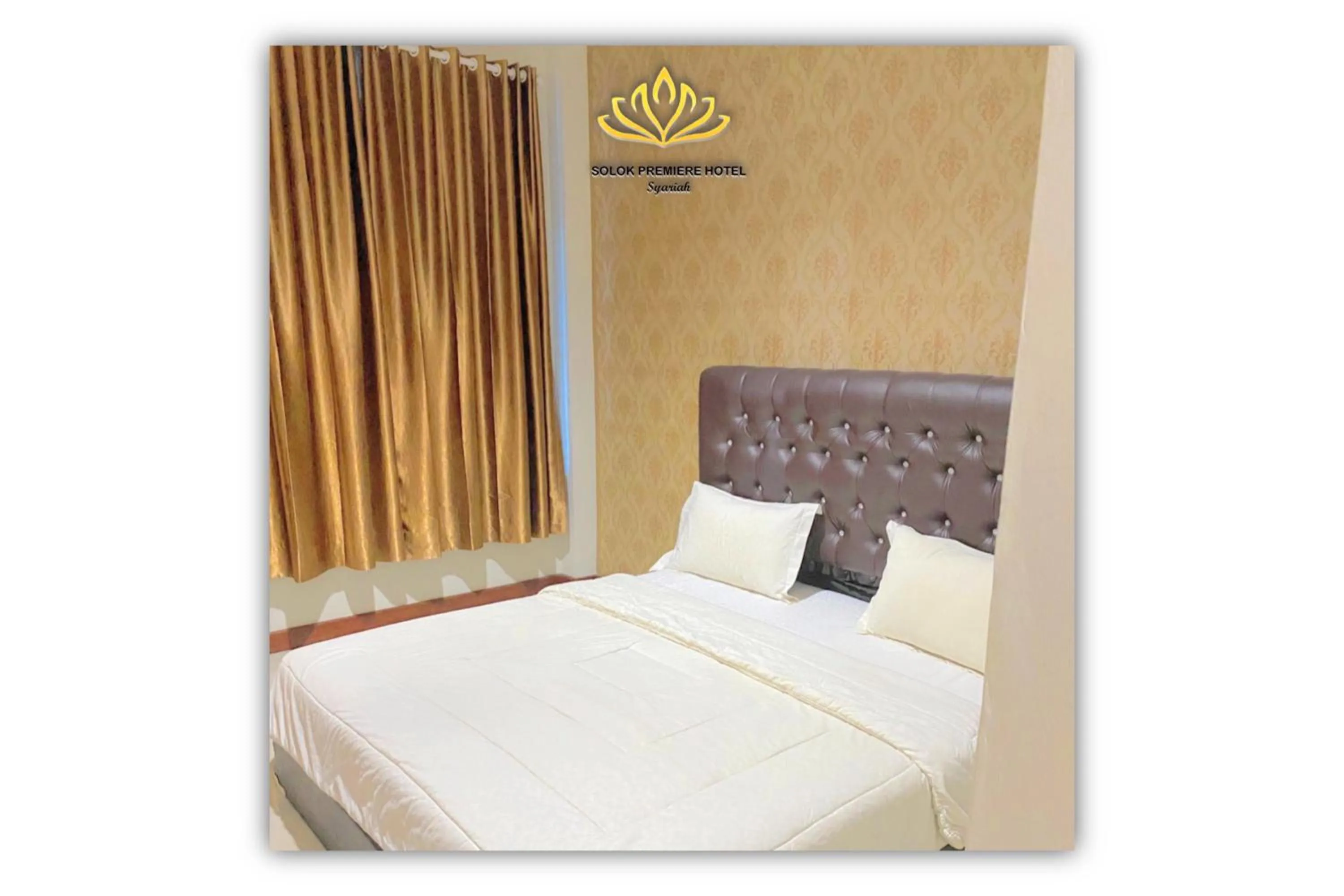 Bed in Solok Premier Hotel