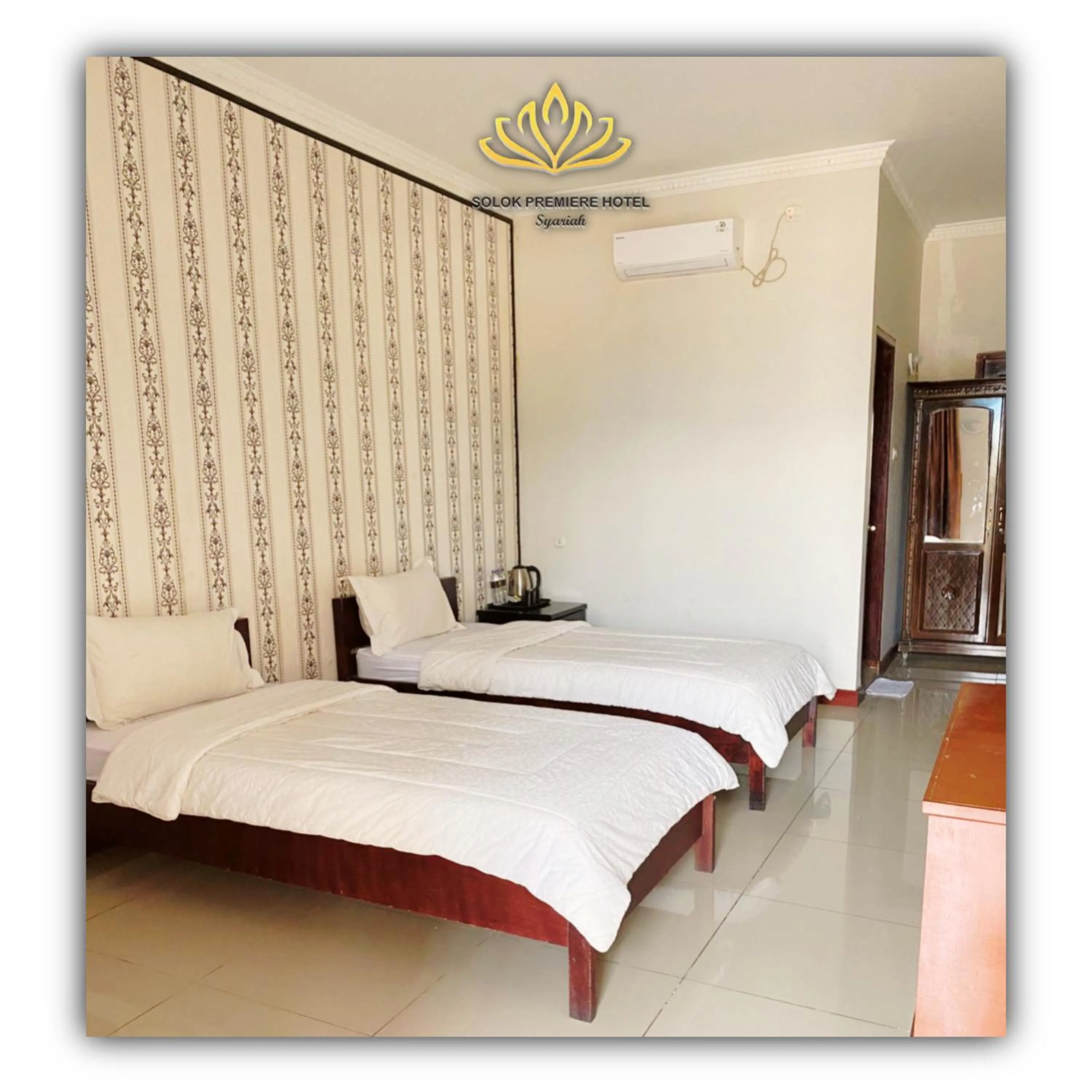 Bed in Solok Premier Hotel