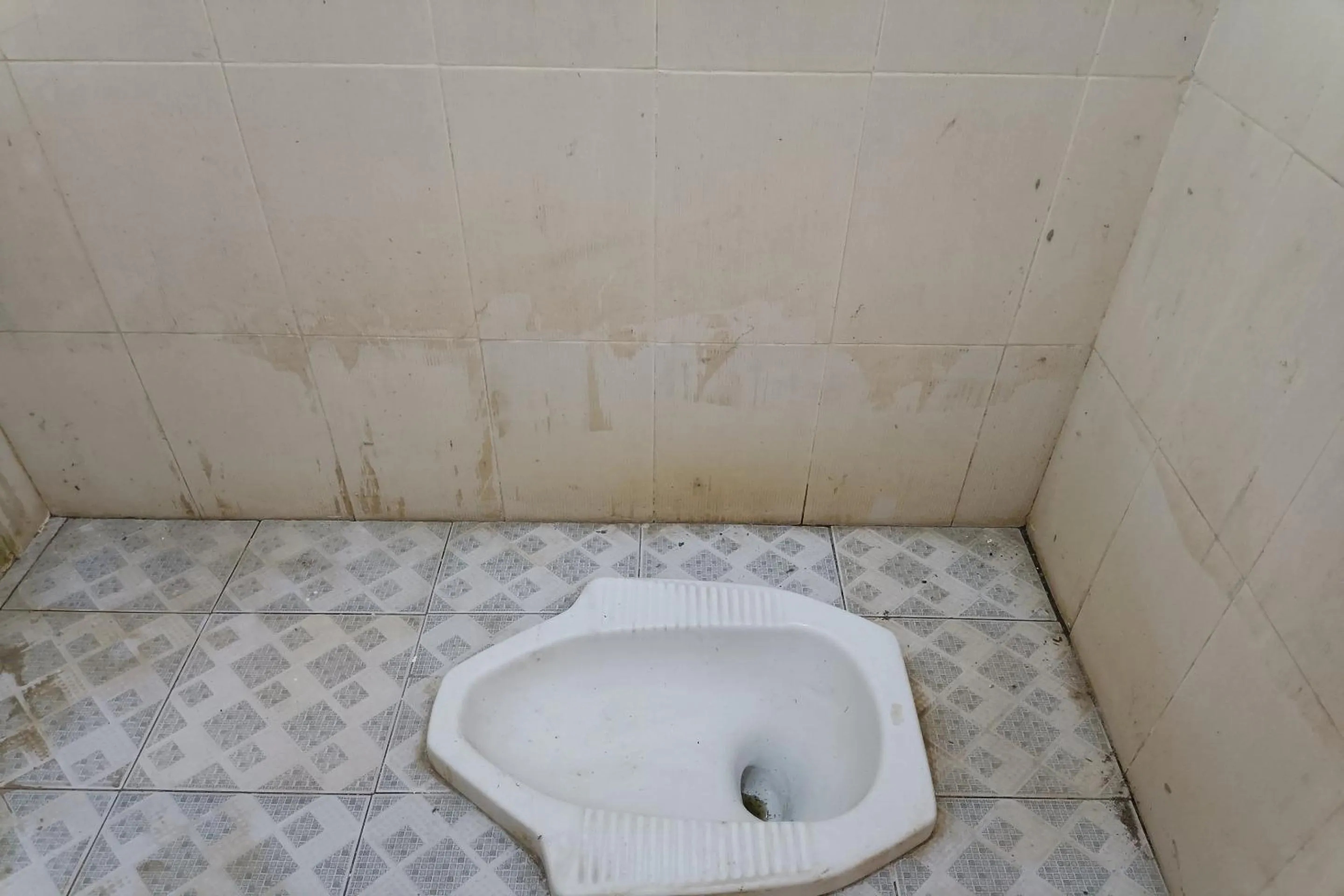 Bathroom in Hotel O Yuda Family Homestay Near Desa Wisata Hijau Bilebante