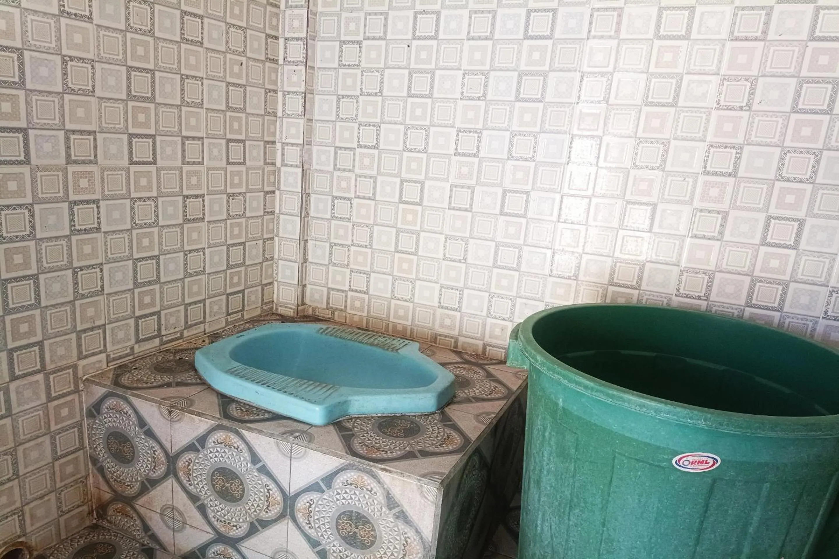 Bathroom in Hotel O Yuda Family Homestay Near Desa Wisata Hijau Bilebante