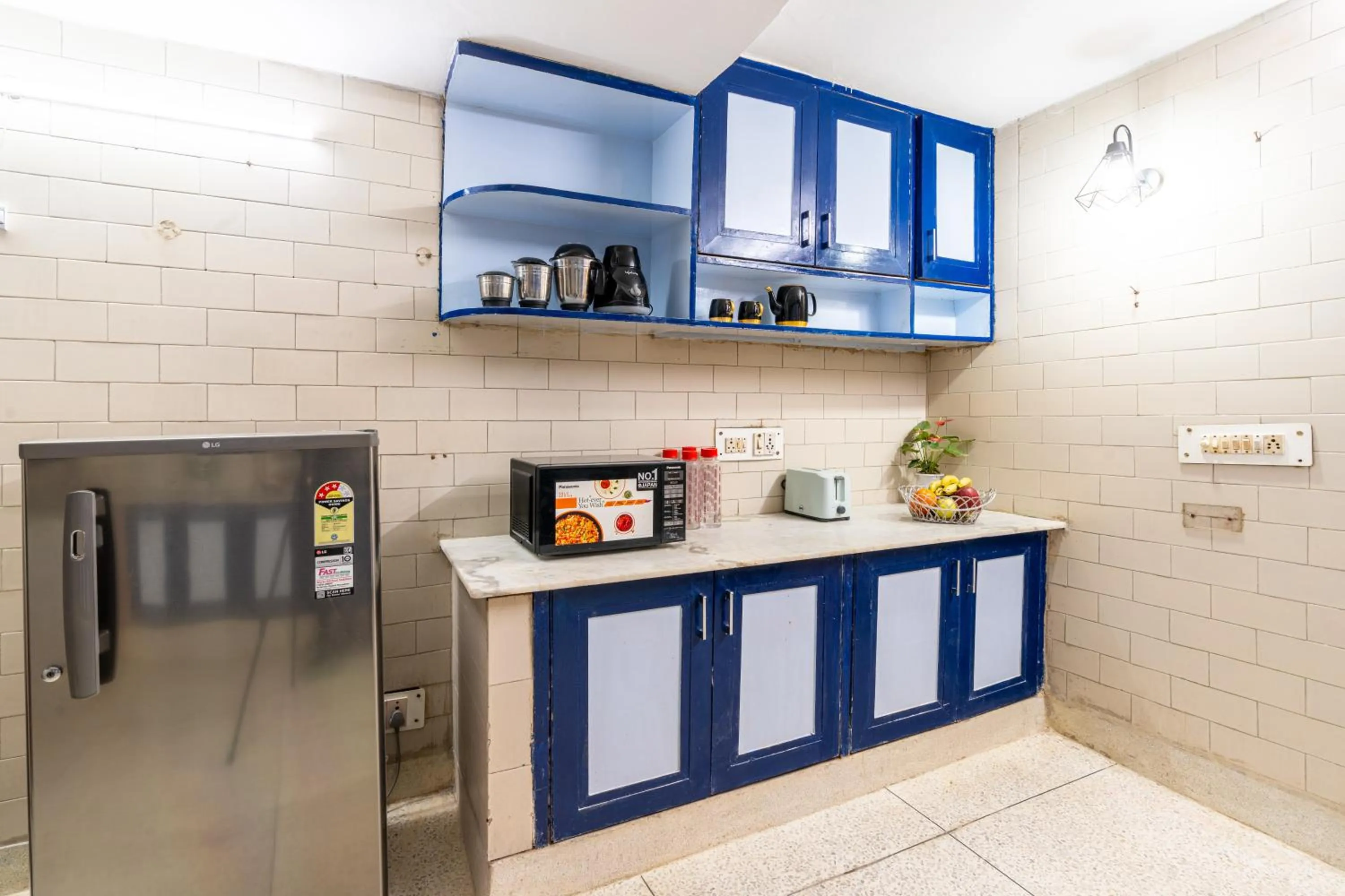 Kitchen or kitchenette in Homlee-Excellency Large 4BHK-South Delhi- NFC