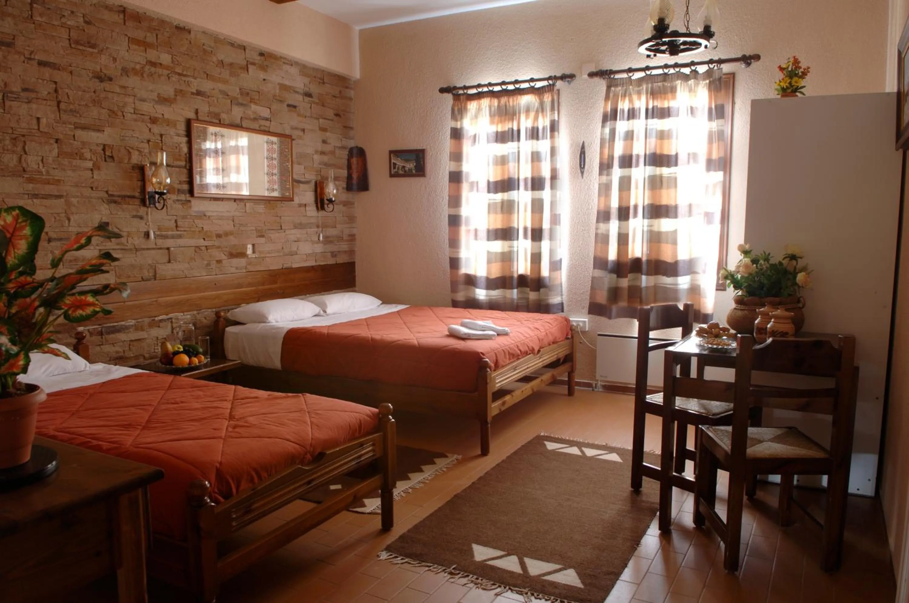 Bed in Rigas Hotel Arachova
