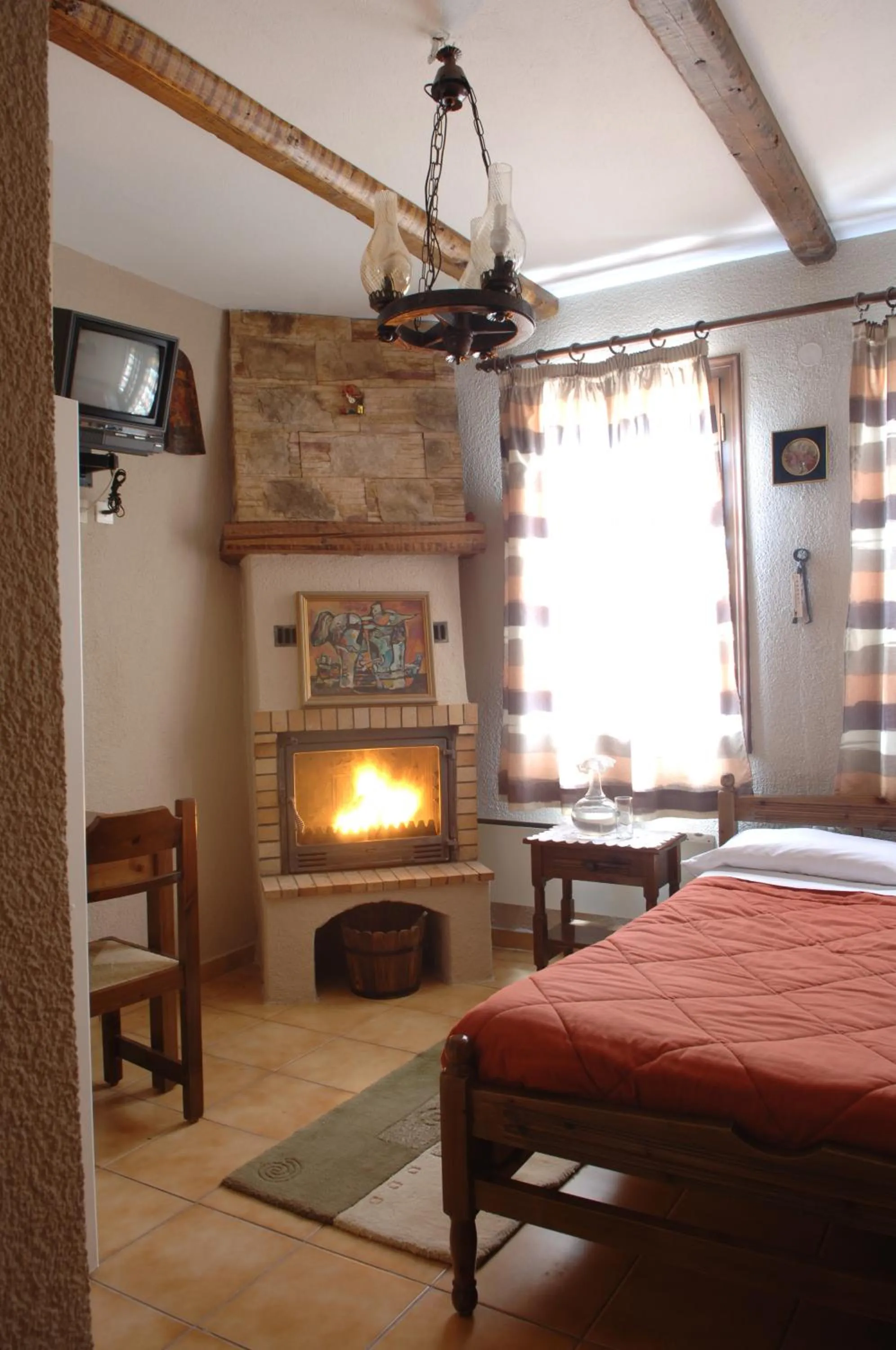 Bed in Rigas Hotel Arachova