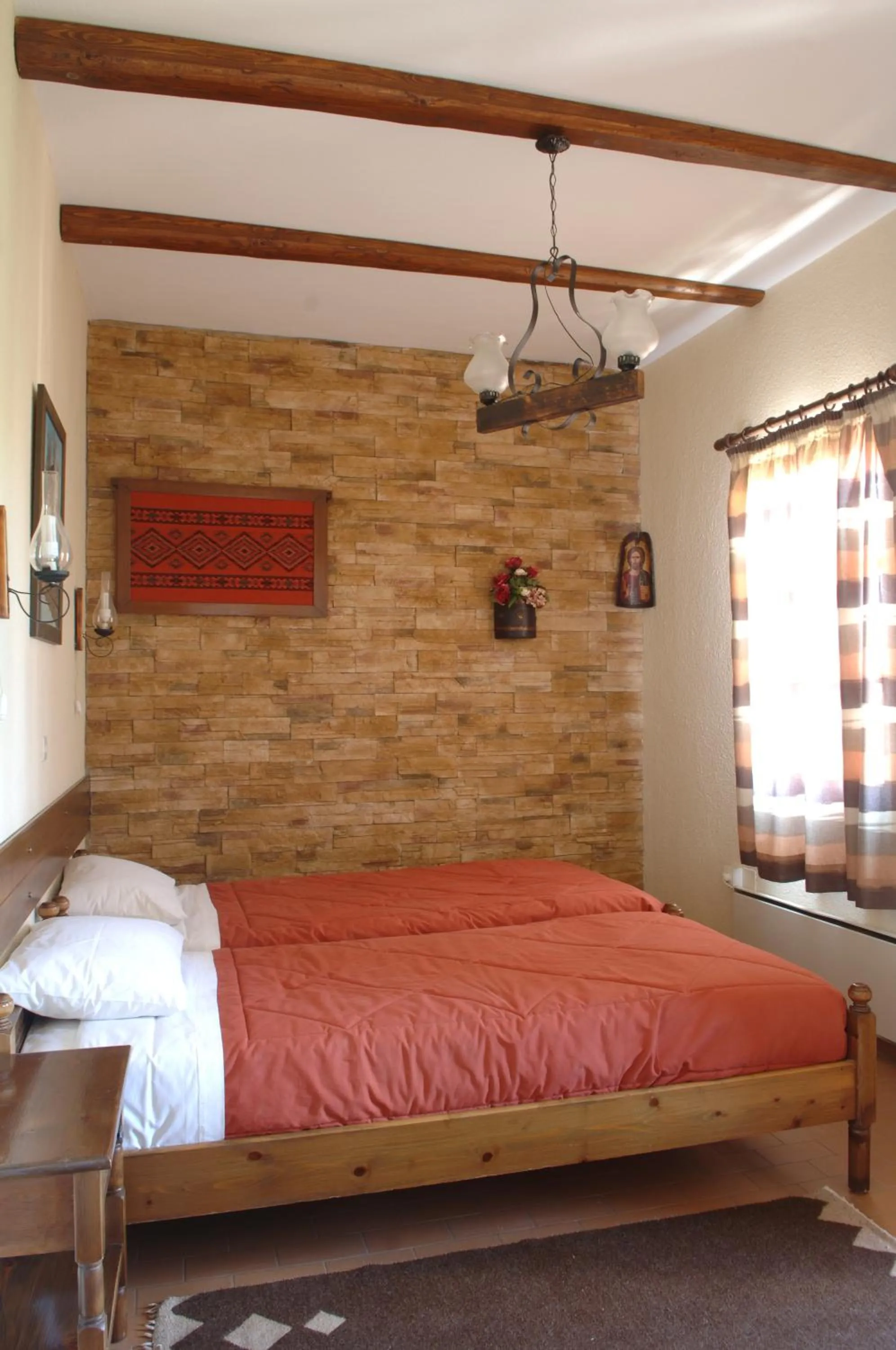 Bed in Rigas Hotel Arachova